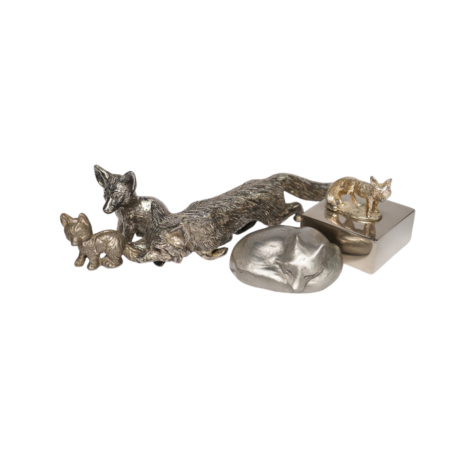 A collection of silver plated, pewter and white metal models of foxes, glass paperweight, button hooks, etc. Condition - mostly fair                                                                                        
