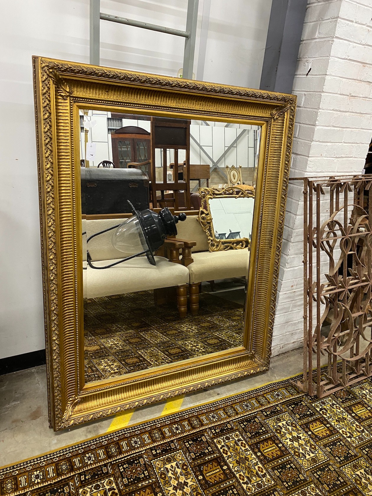 A large Victorian style rectangular gilt framed wall mirror, width 122cm, height 156cm                                                                                                                                      