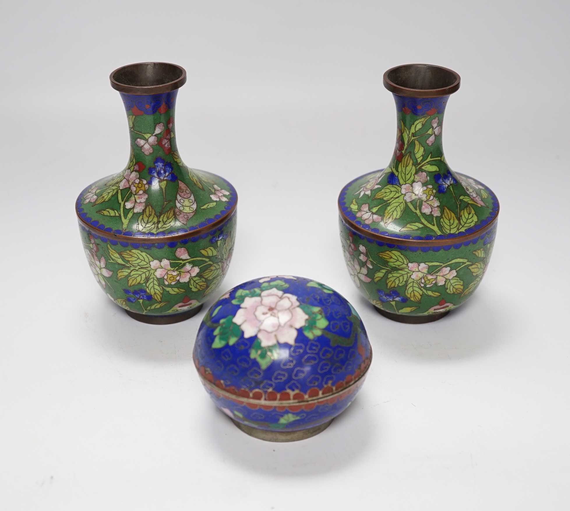 A pair of Chinese cloisonné enamel vases and a box and cover, vases 14cm high                                                                                                                                               