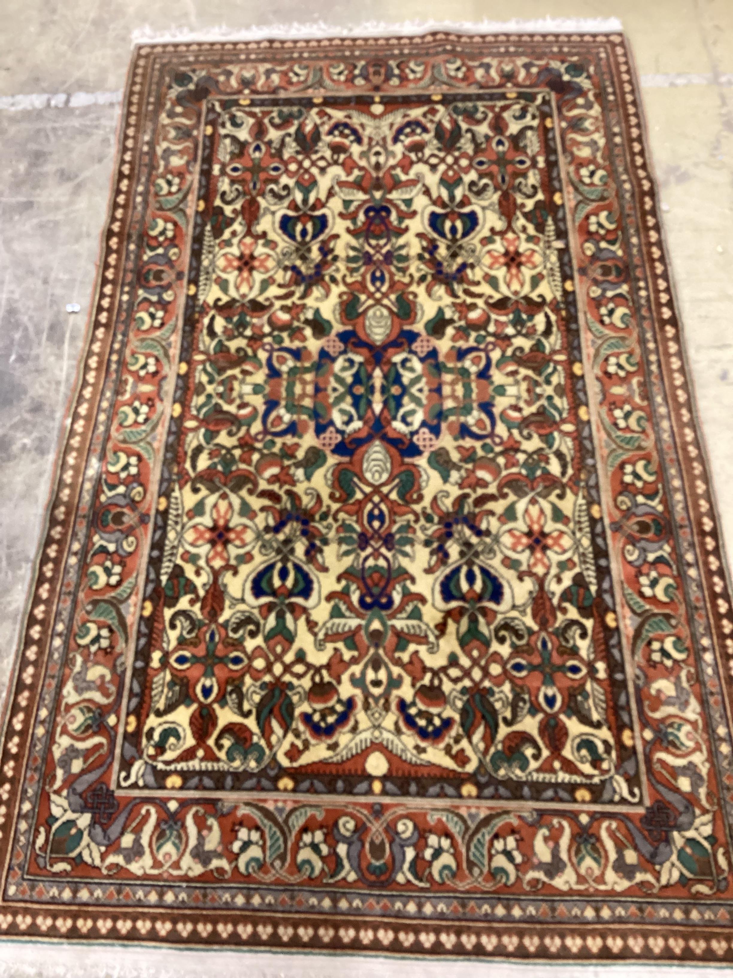A North West Persian ivory ground rug, 208 x 124cm                                                                                                                                                                          