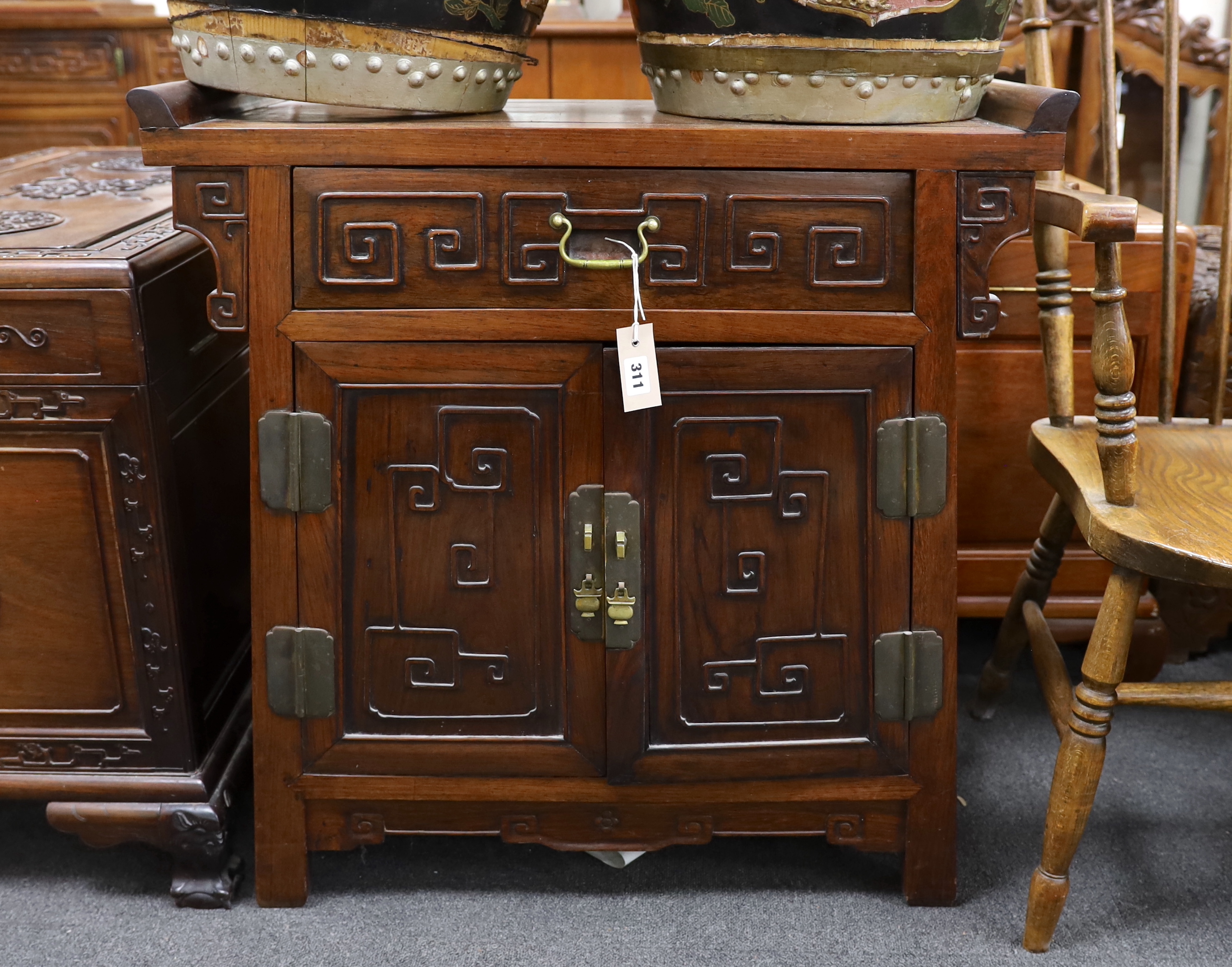 A small Asian carved hardwood side cabinet, width 77cm, depth 38cm, height 79cm                                                                                                                                             