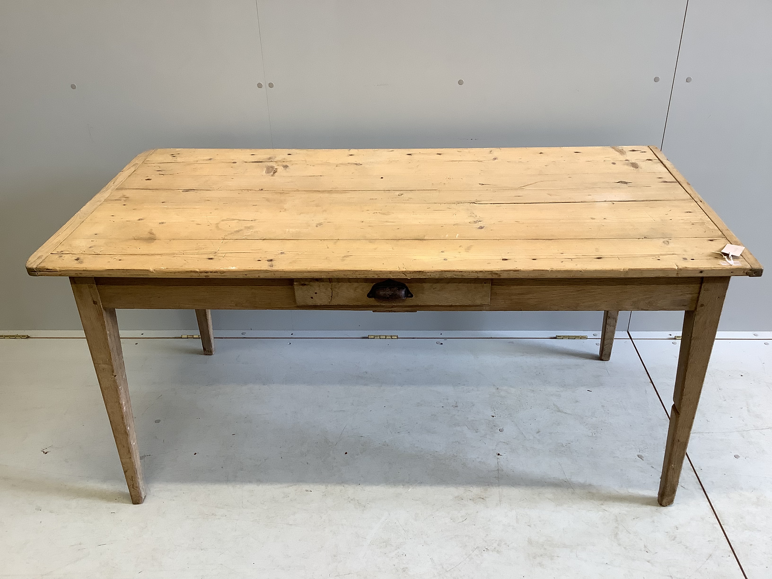A Victorian rectangular pine kitchen table, width 152cm, depth 76cm, height 72cm                                                                                                                                            