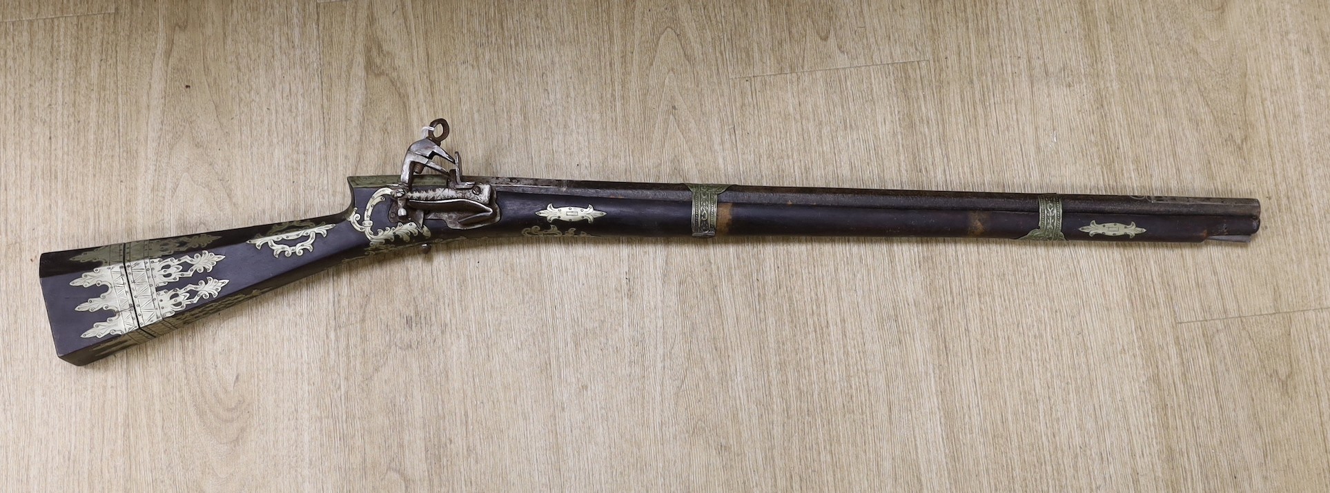 An Eastern antique flintlock musket                                                                                                                                                                                         