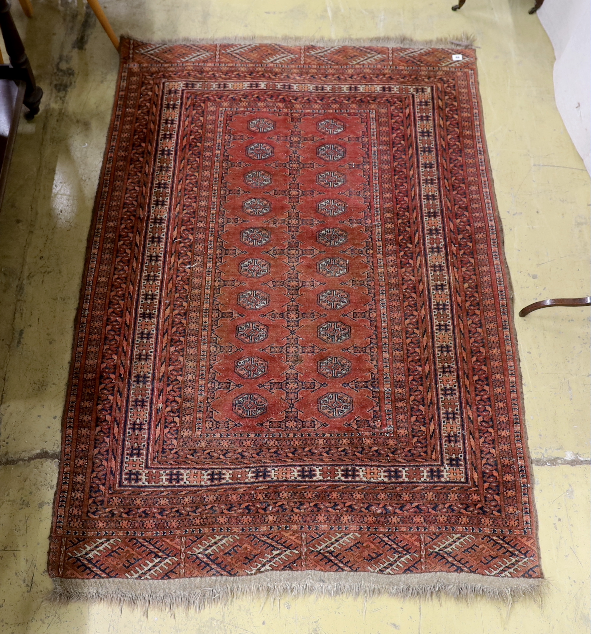 A Bokhara red ground rug, 158 x 124cm                                                                                                                                                                                       