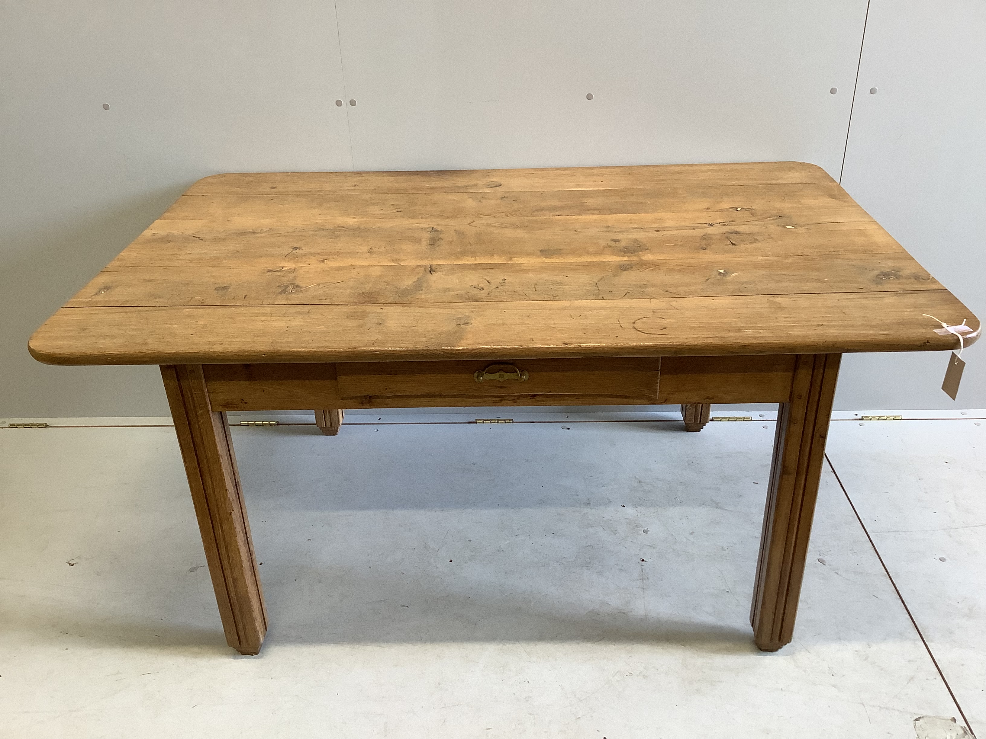 A late 19th century French rectangular oak kitchen table, width 152cm, depth 98cm, height 72cm                                                                                                                              