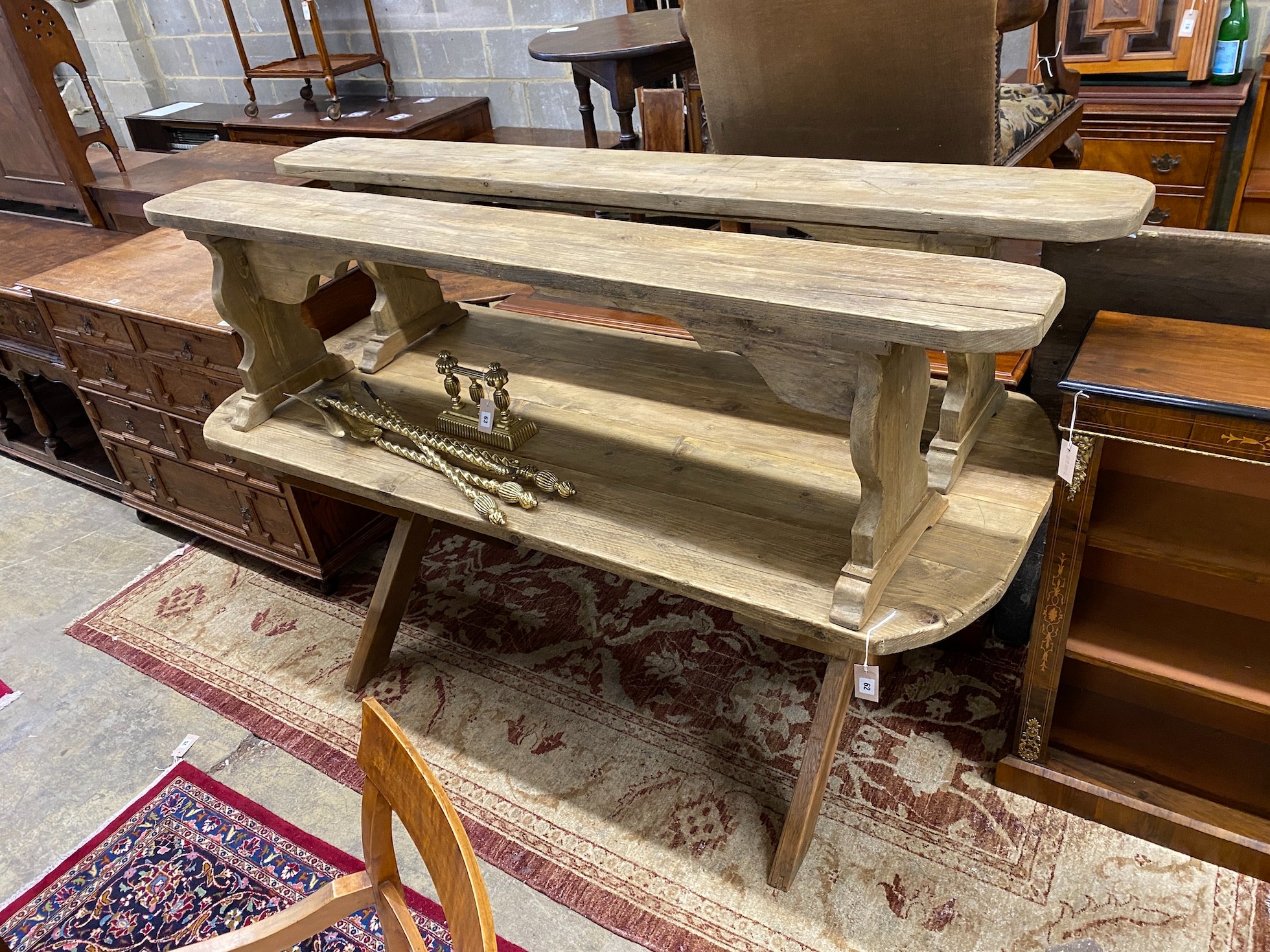 A 19th century style pine tavern table, width 184cm, depth 79cm, height 76cm, and a pair of benches                                                                                                                         