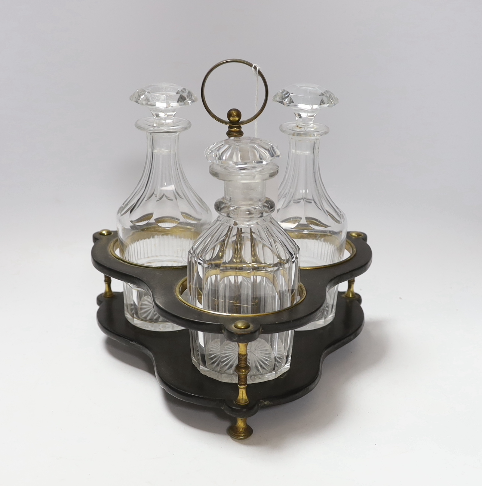 A Regency decanter stand holding three associated cut glass decanters, 24cm                                                                                                                                                 