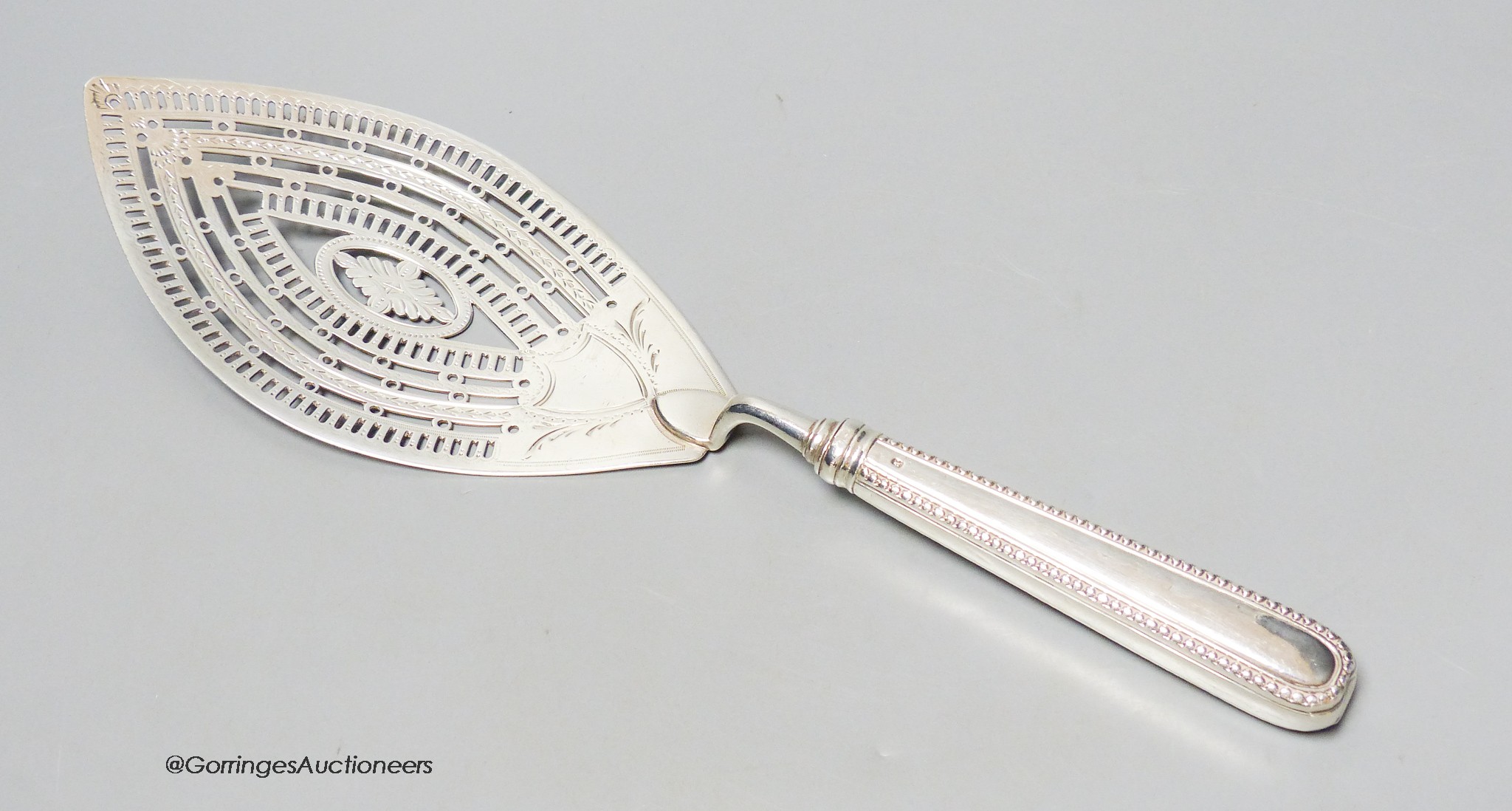 A large George IV silver fish slice, William Abdy I, London, 1784, 30.2cm, loaded handle, gross 4.5oz.                                                                                                                      