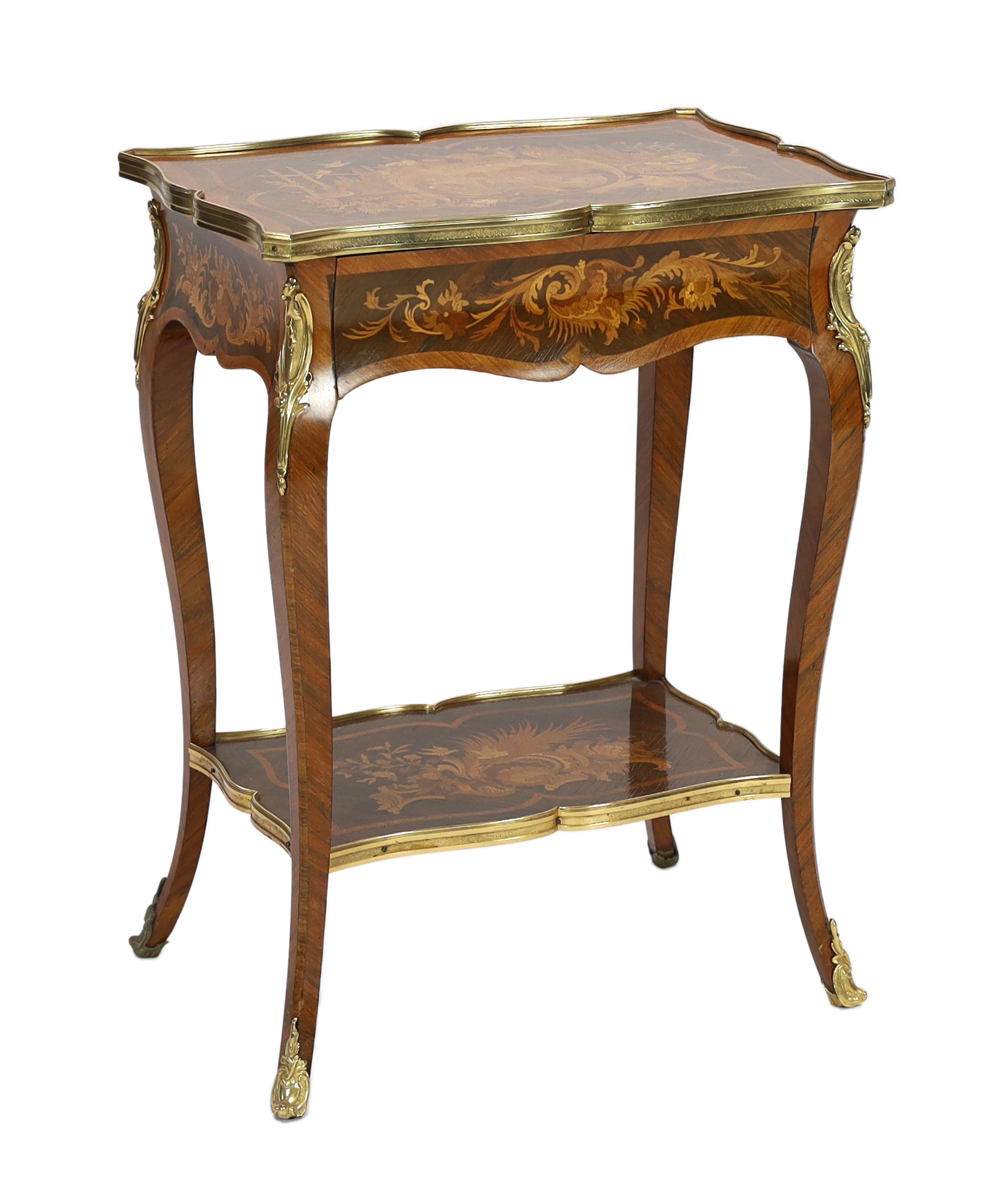 A Louis XV style ormolu mounted marquetry side table, 56cm wide, 38cm deep, 75cm high, Please note this lot attracts an additional import tax of 5% on the hammer price                                                     