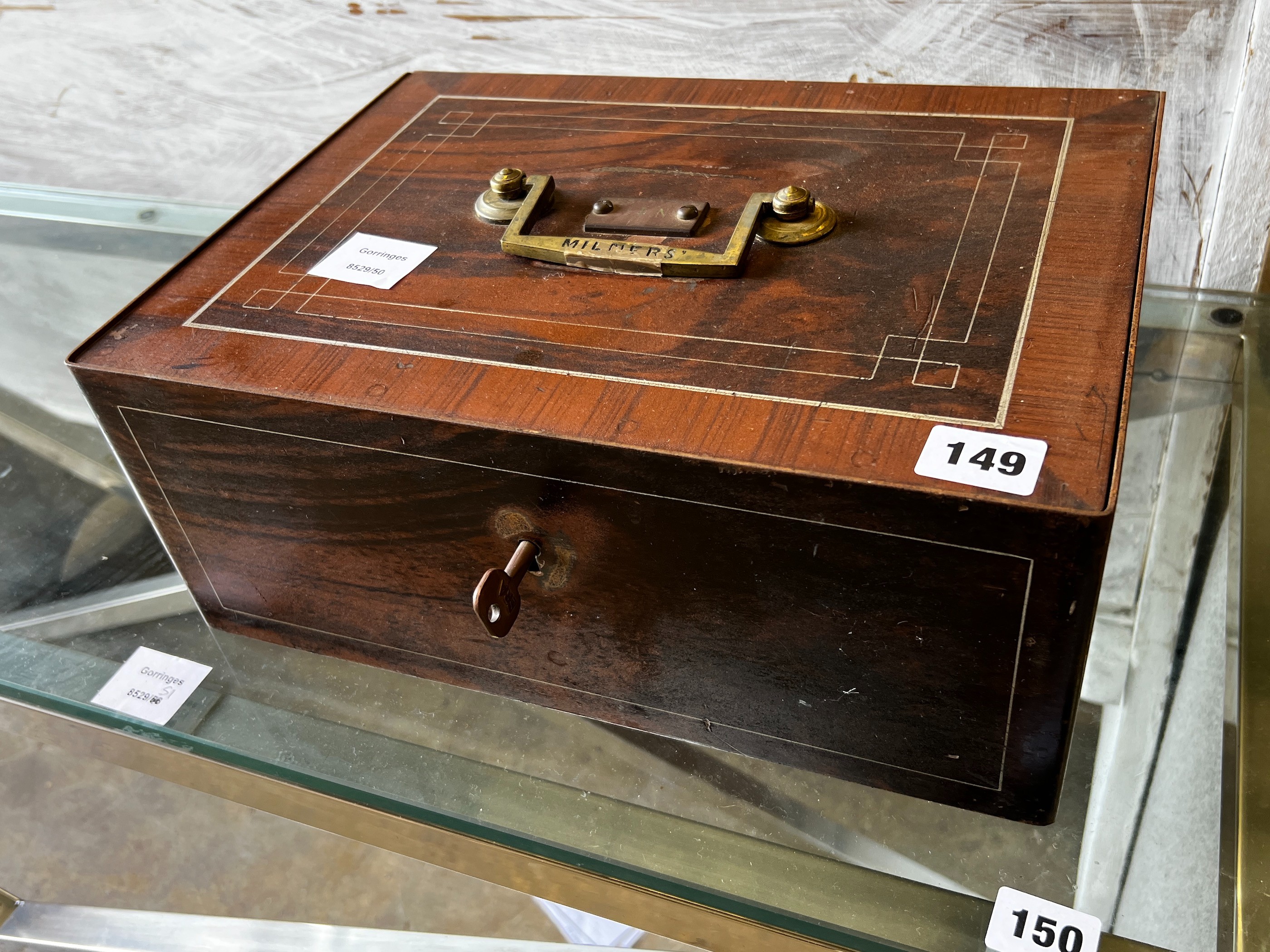 A milner's strong box with painted simulated grain, width 35cm, depth 26cm, height 14cm                                                                                                                                     