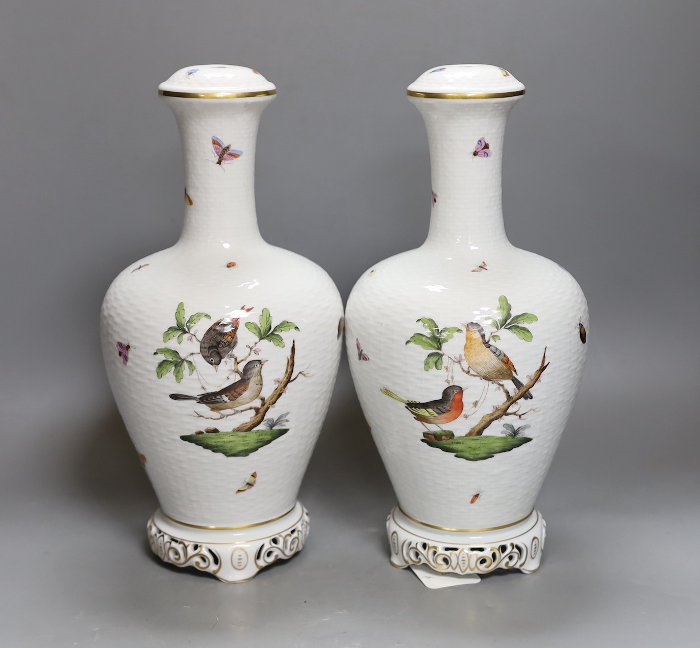 A pair of Herend Rothschild Birds pattern lamps, lacking fittings and wiring, 32cm tall                                                                                                                                     