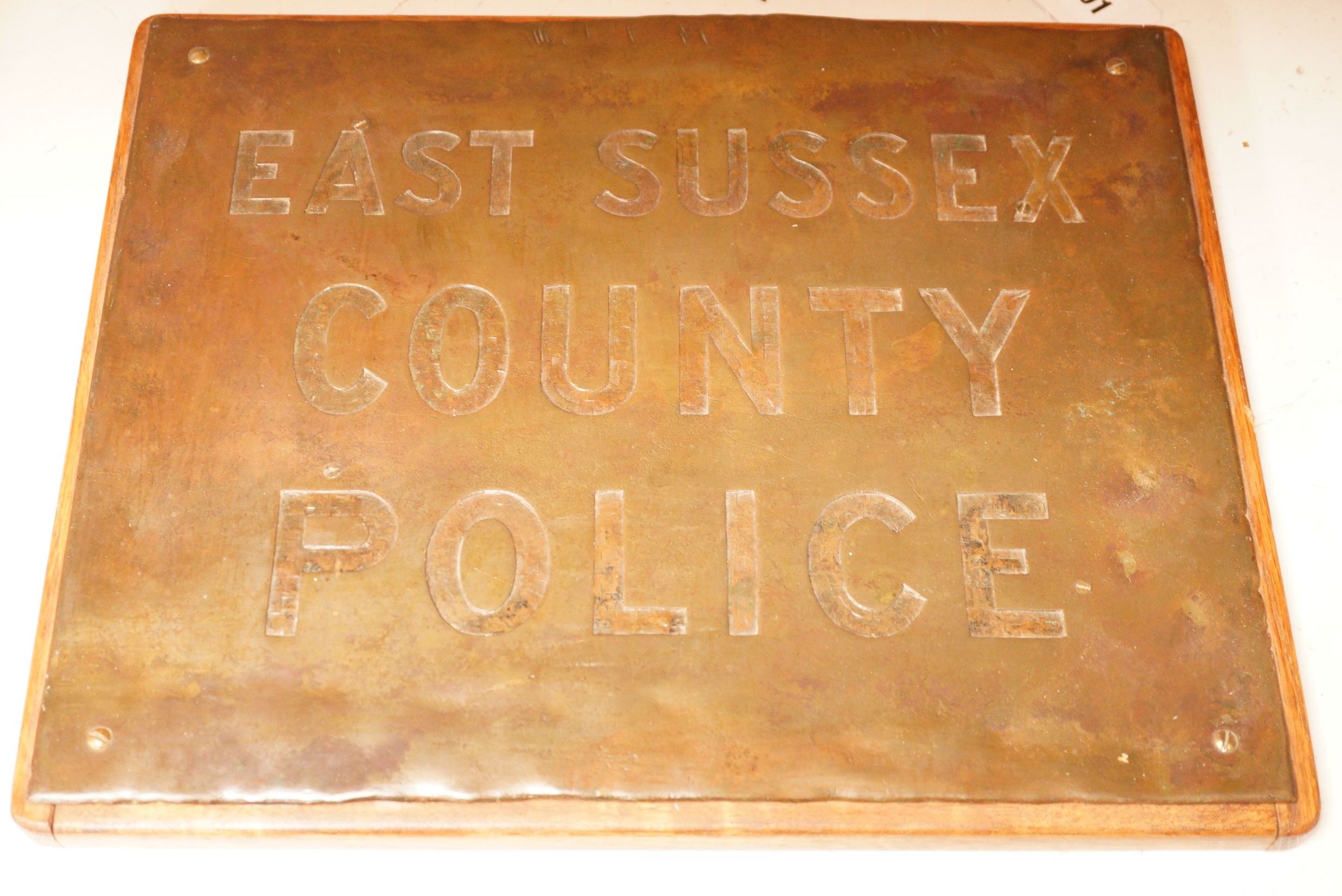 An 'East Sussex County Police' wall mounted sign, 32x40cm                                                                                                                                                                   