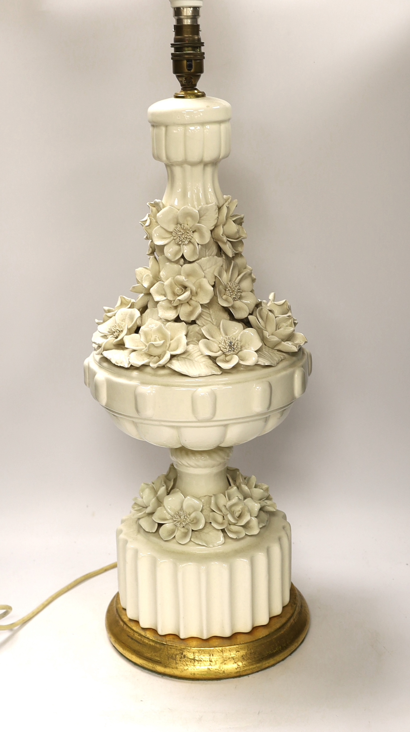 A large floral column table lamp on circular gilt base, 64cm high including the fitting                                                                                                                                     