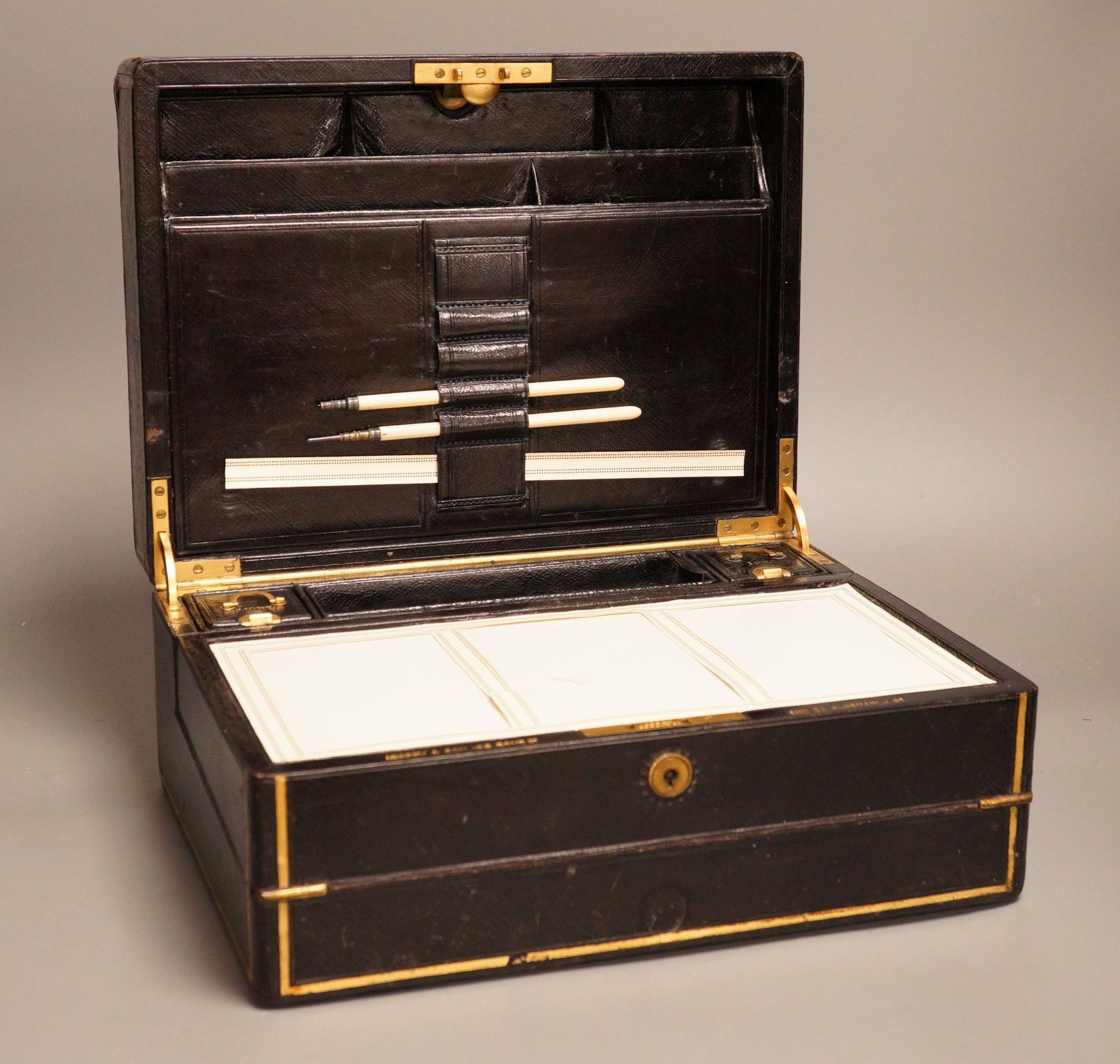 An Asprey & Son Morocco leather clad travelling writing box, 31 cm wide                                                                                                                                                     