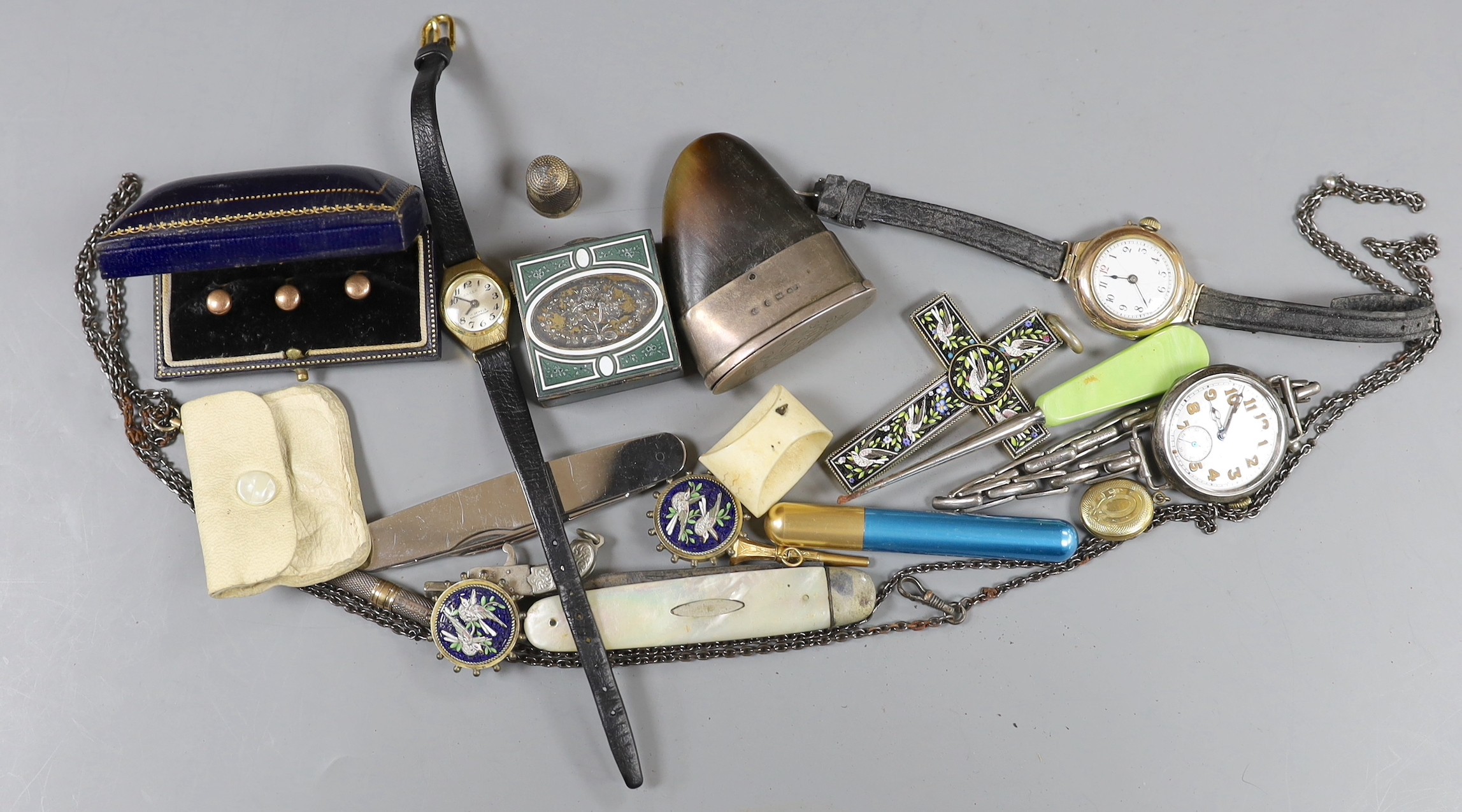 An early 20th century lady's 9ct gold wrist watch and sundry minor jewellery and accessories, including a German 950 white metal and enamel pill box.                                                                       