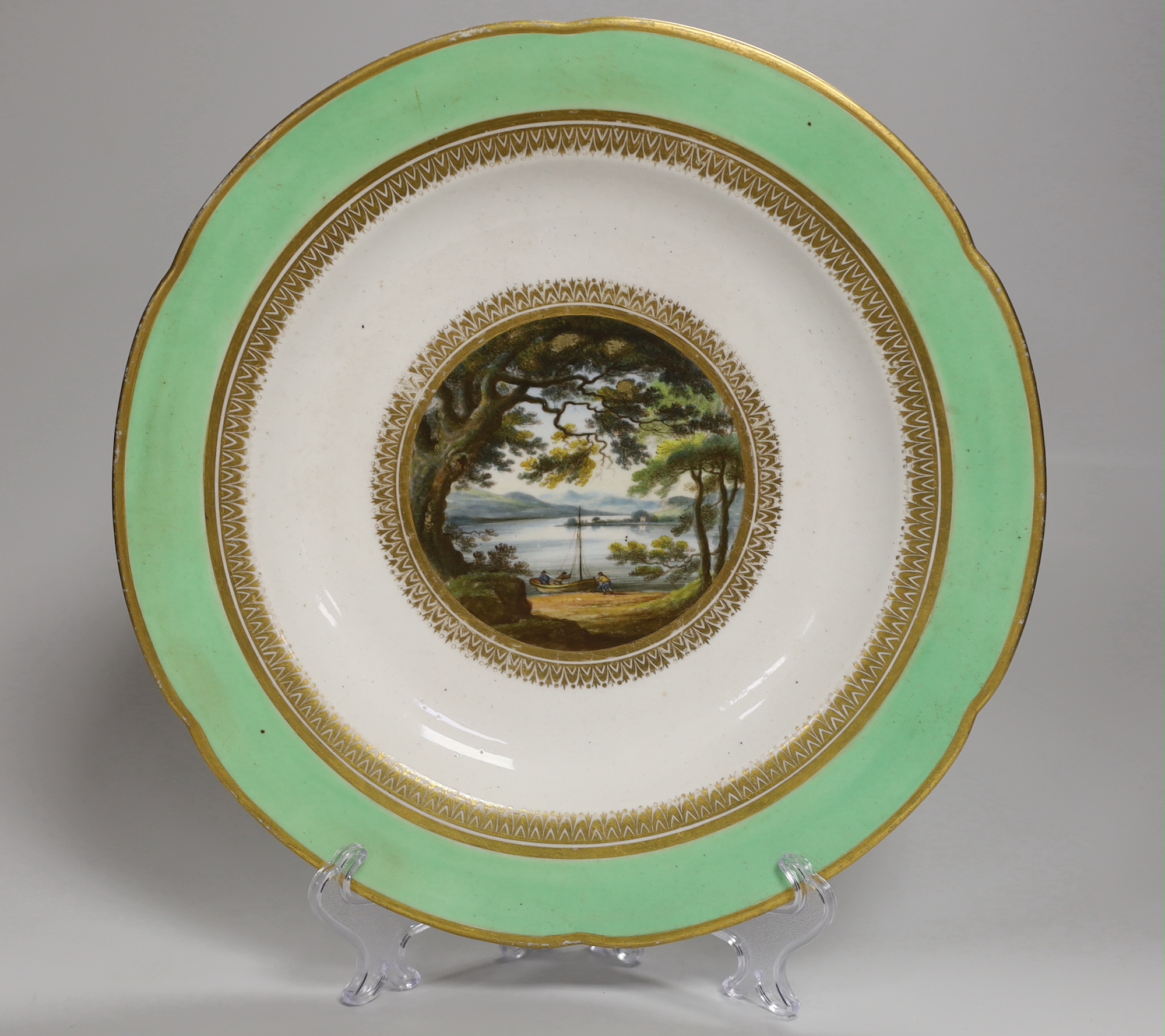 An 18th century Derby plate by George Robertson painted with Bela Lake Merionethshire, Titled, blue mark, 26cm diameter                                                                                                     