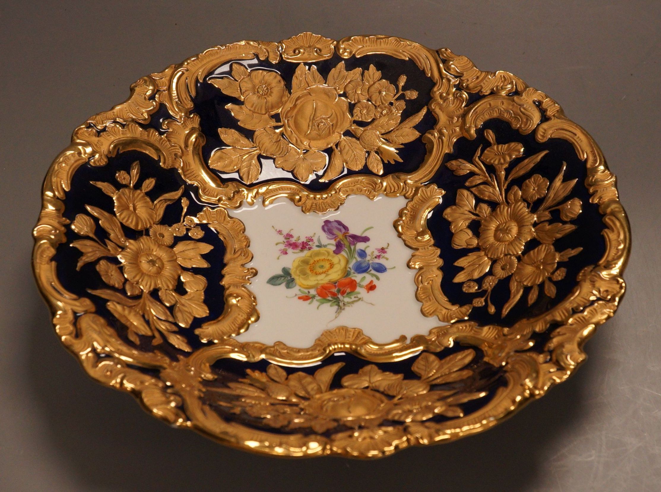 An early 20th Meissen century gilt floral blue and white dish, 27.5cm diameter                                                                                                                                              