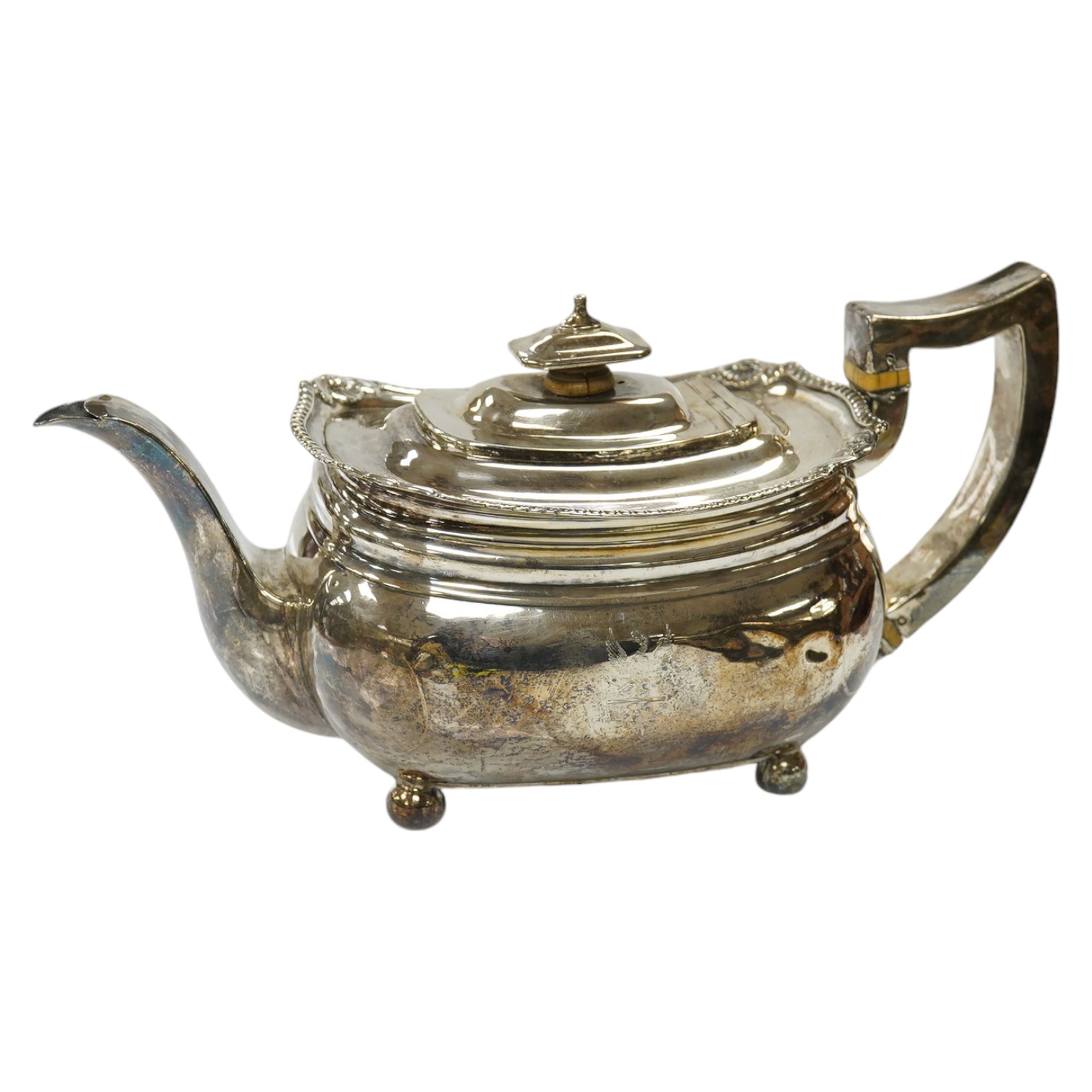 A George III silver teapot, Charles Chesterman II, London, 1810, gross weight 17.9oz. CITES Submission reference 85XWF6ED. Condition - poor                                                                                 