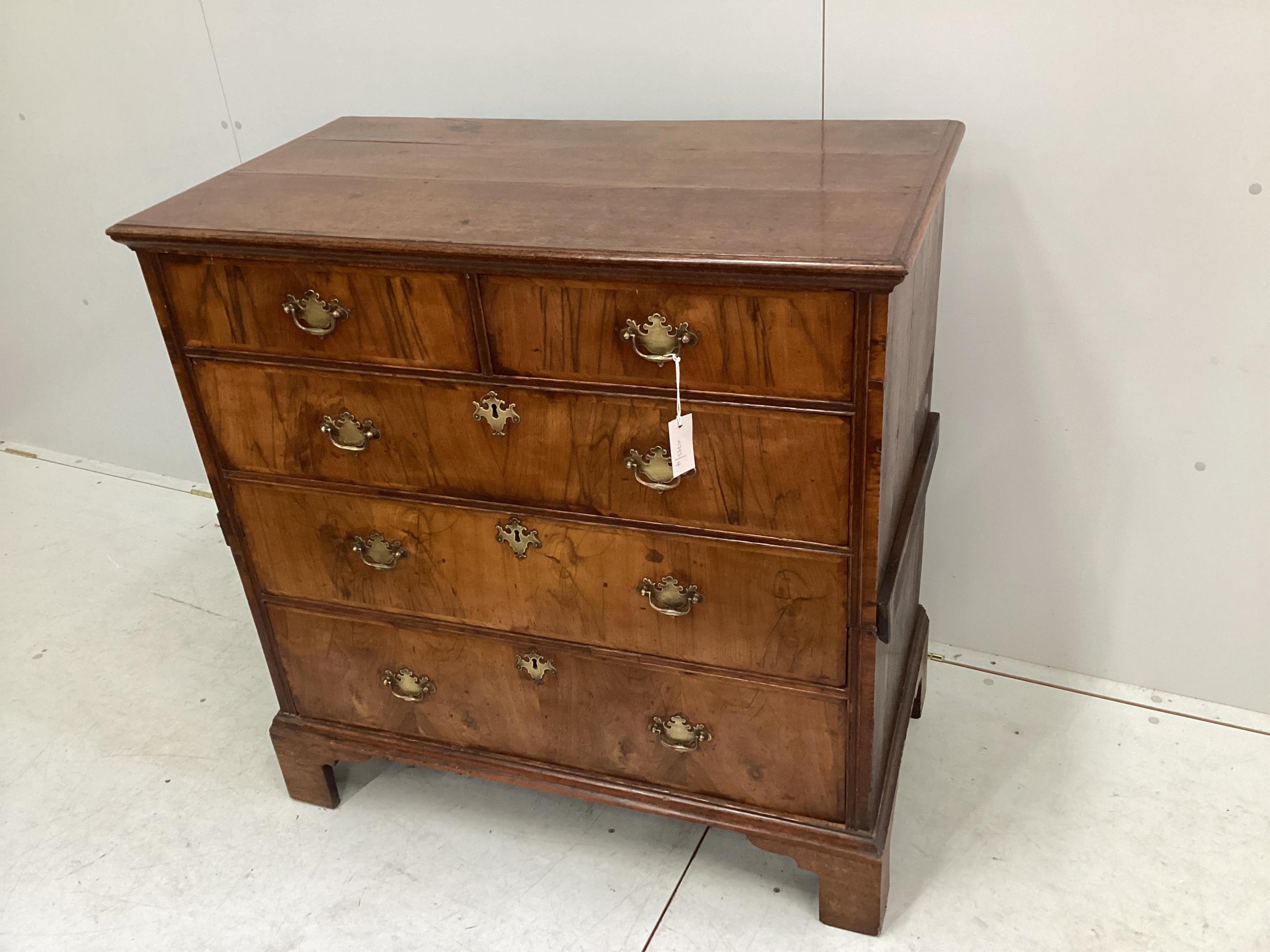 An 18th century oak and walnut, pine sided five drawer chest, width 99cm, depth 54m, height 100cm. Condition - fair to good                                                                                                 