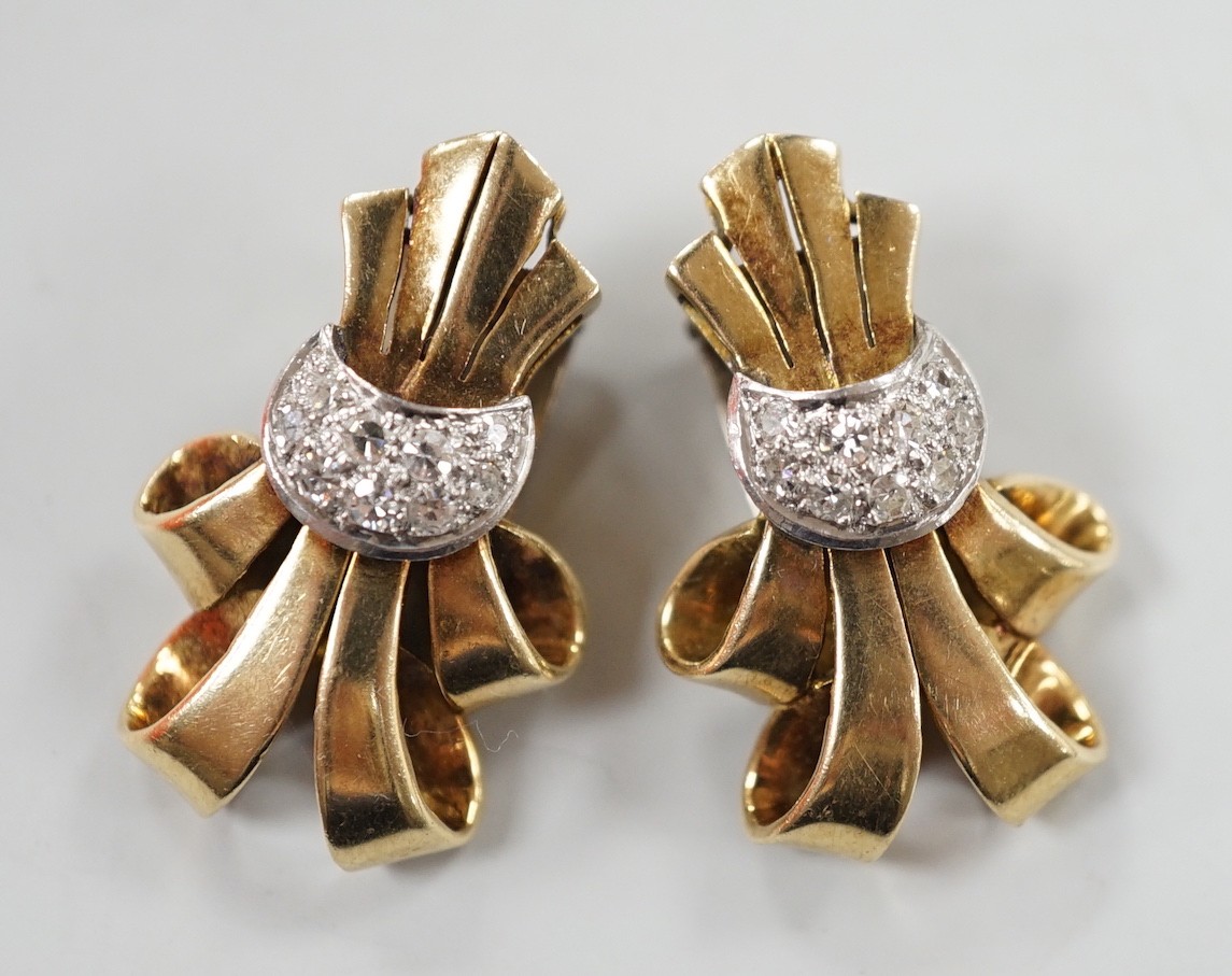 A pair of mid 20th century yellow and white metal, diamond cluster set scroll ear clips, 27mm, gross weight 13.5 grams.                                                                                                     