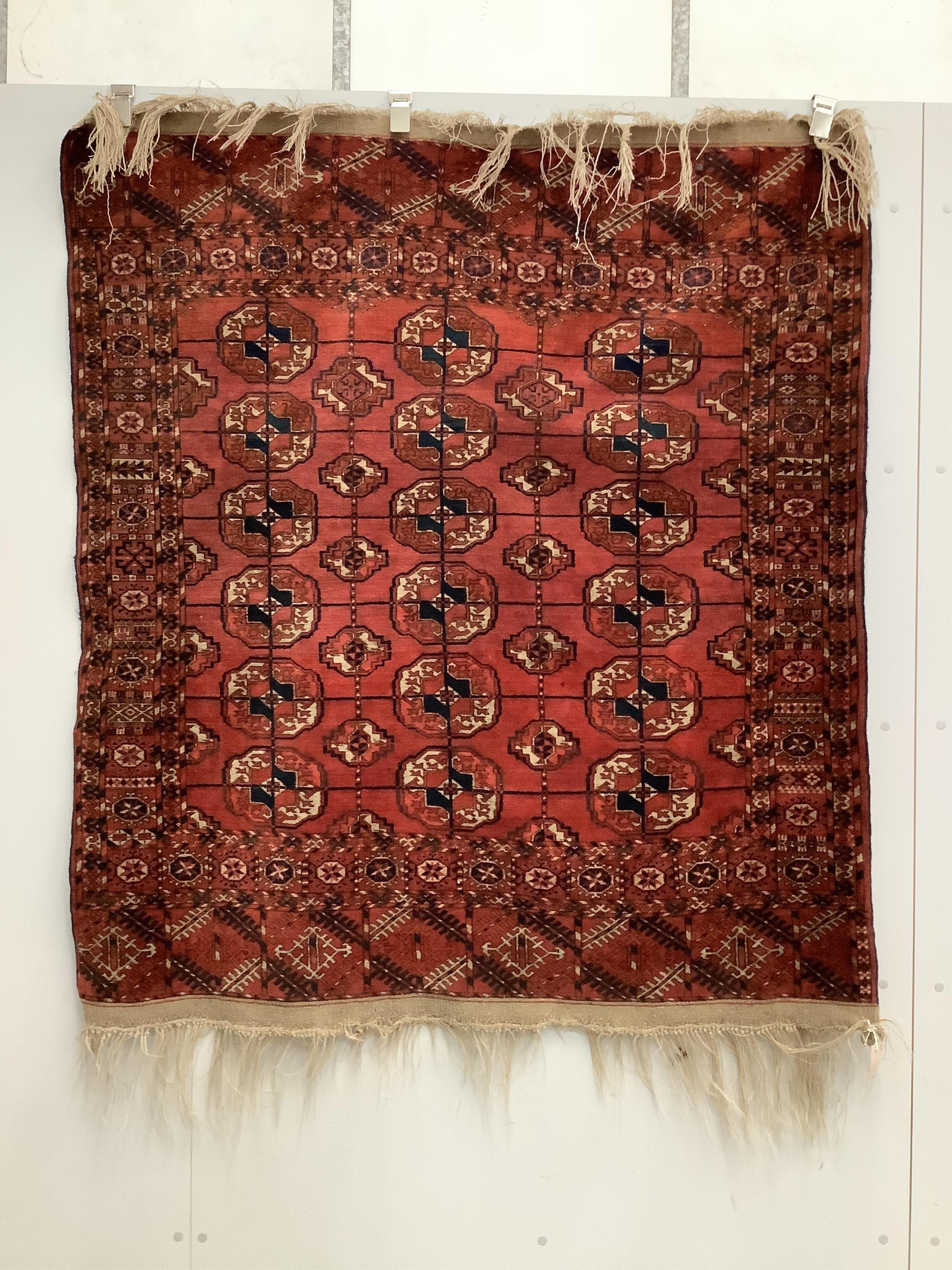 Three assorted Caucasian/ Bokhara rugs, largest 150 x 134cm. Condition - fair                                                                                                                                               