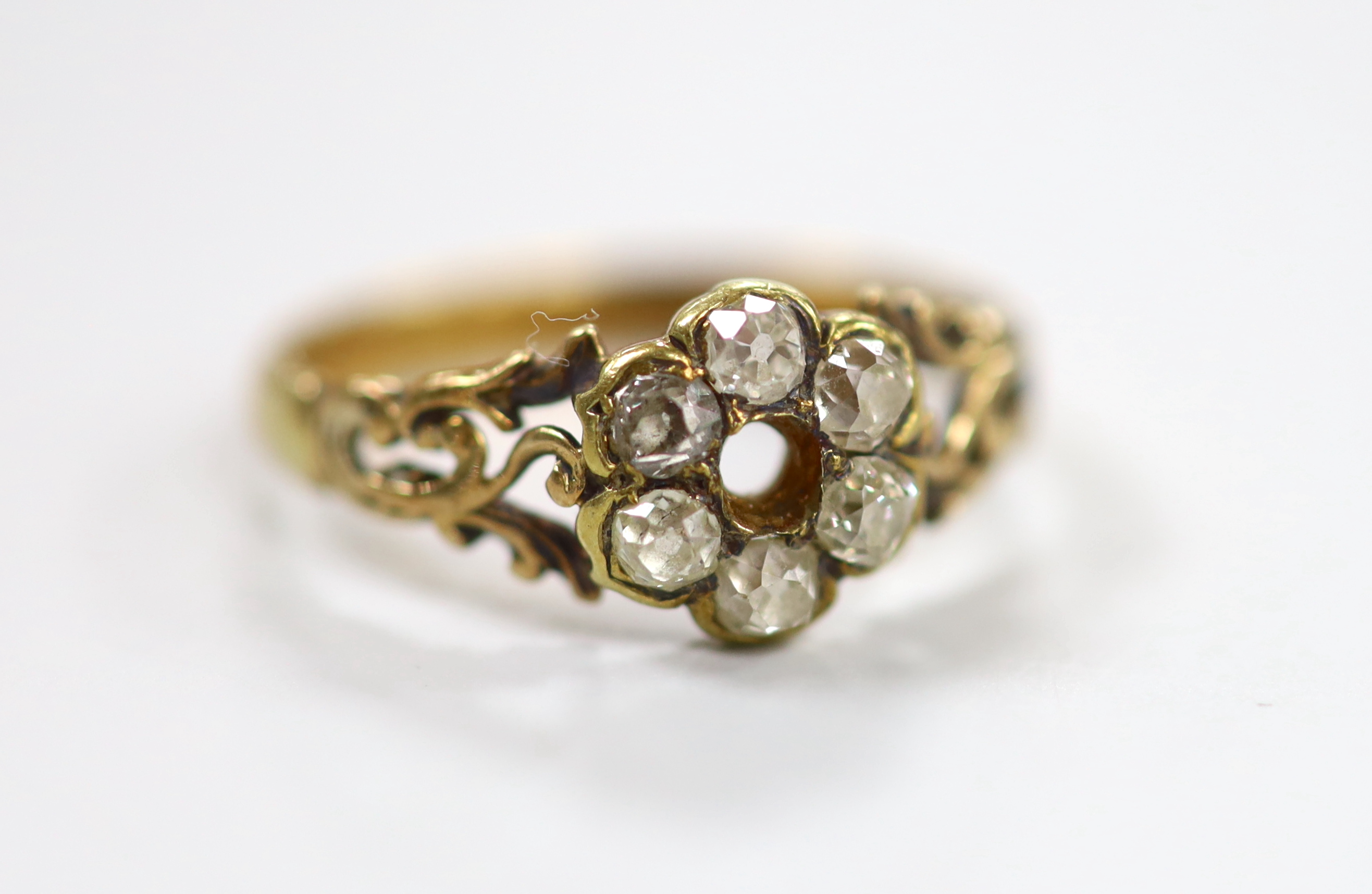 A late Victorian 18ct and diamond cluster set ring (stone missing), size P/Q, gross weight 3.6 grams.                                                                                                                       