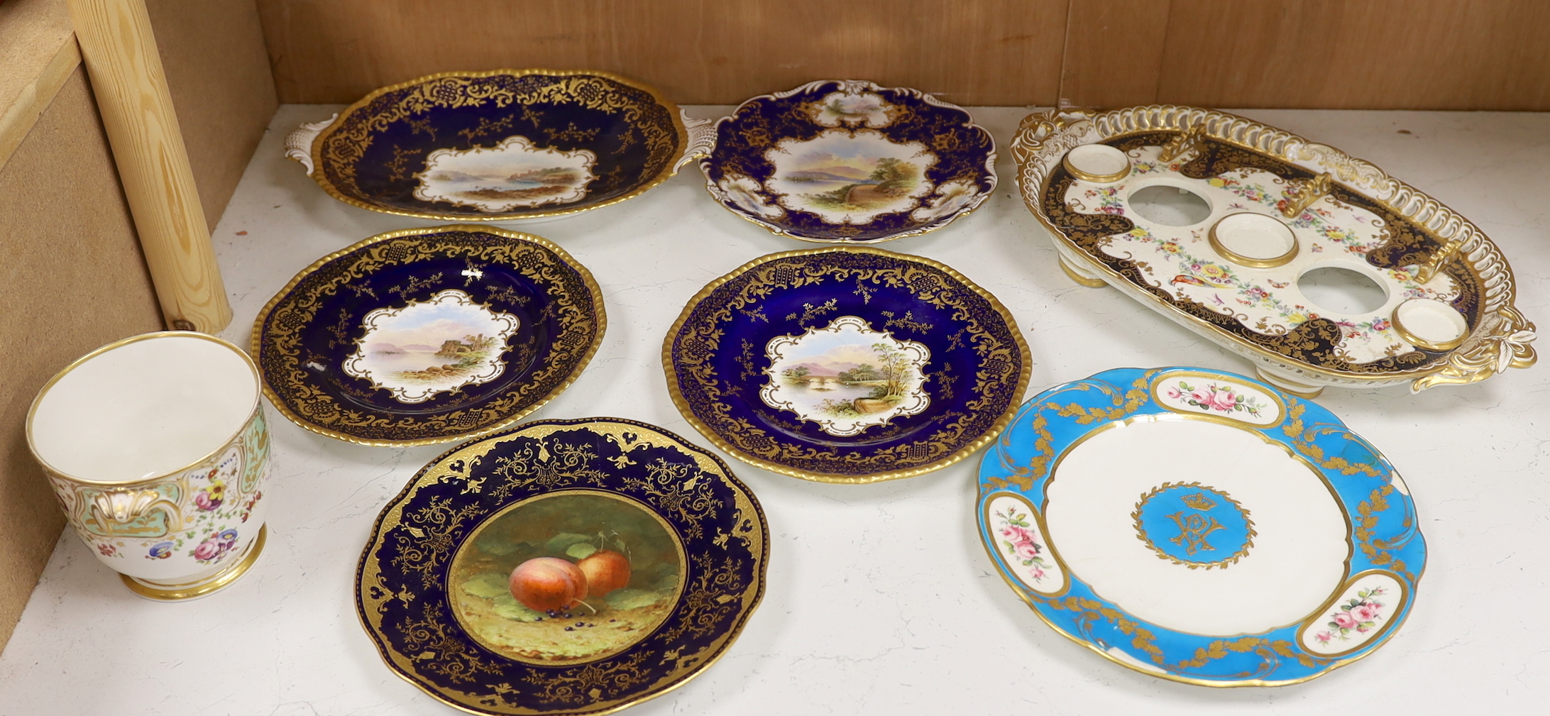 Four 19th century Coalport plates, a Coalport dish, a Minton plate, a Coalport inkstand in Chelsea style and a Derby cache pot, ink stand 40cms wide                                                                        