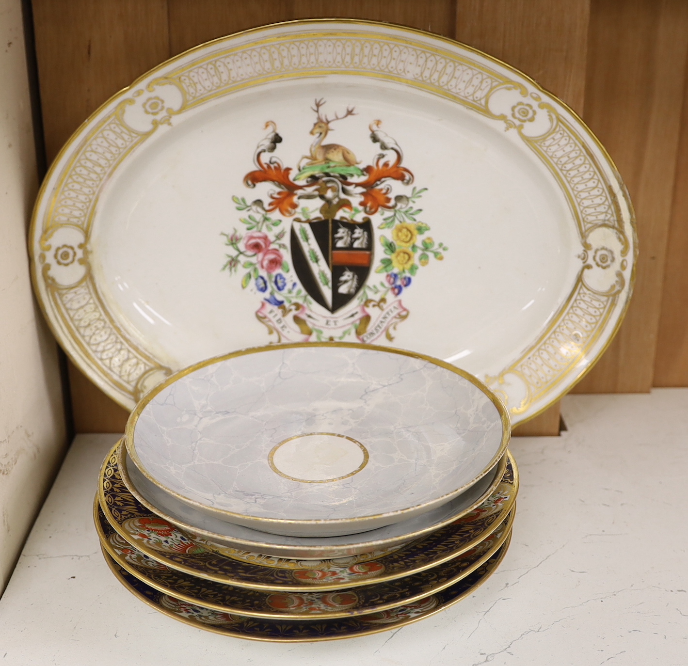 Three early 19th century Chamberlain Imari style plates after the Yeo service, two Barr Flight Barr marble ground saucer dishes and a rare Chamberlain armorial, the largest 35cm wide                                      