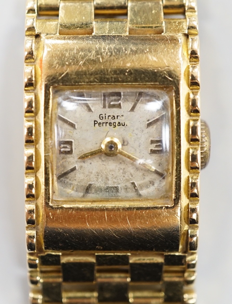 A lady's 18ct gold Girard Perregaux manual wind bracelet watch, overall 17.5cm, gross weight 44.6 grams.                                                                                                                    