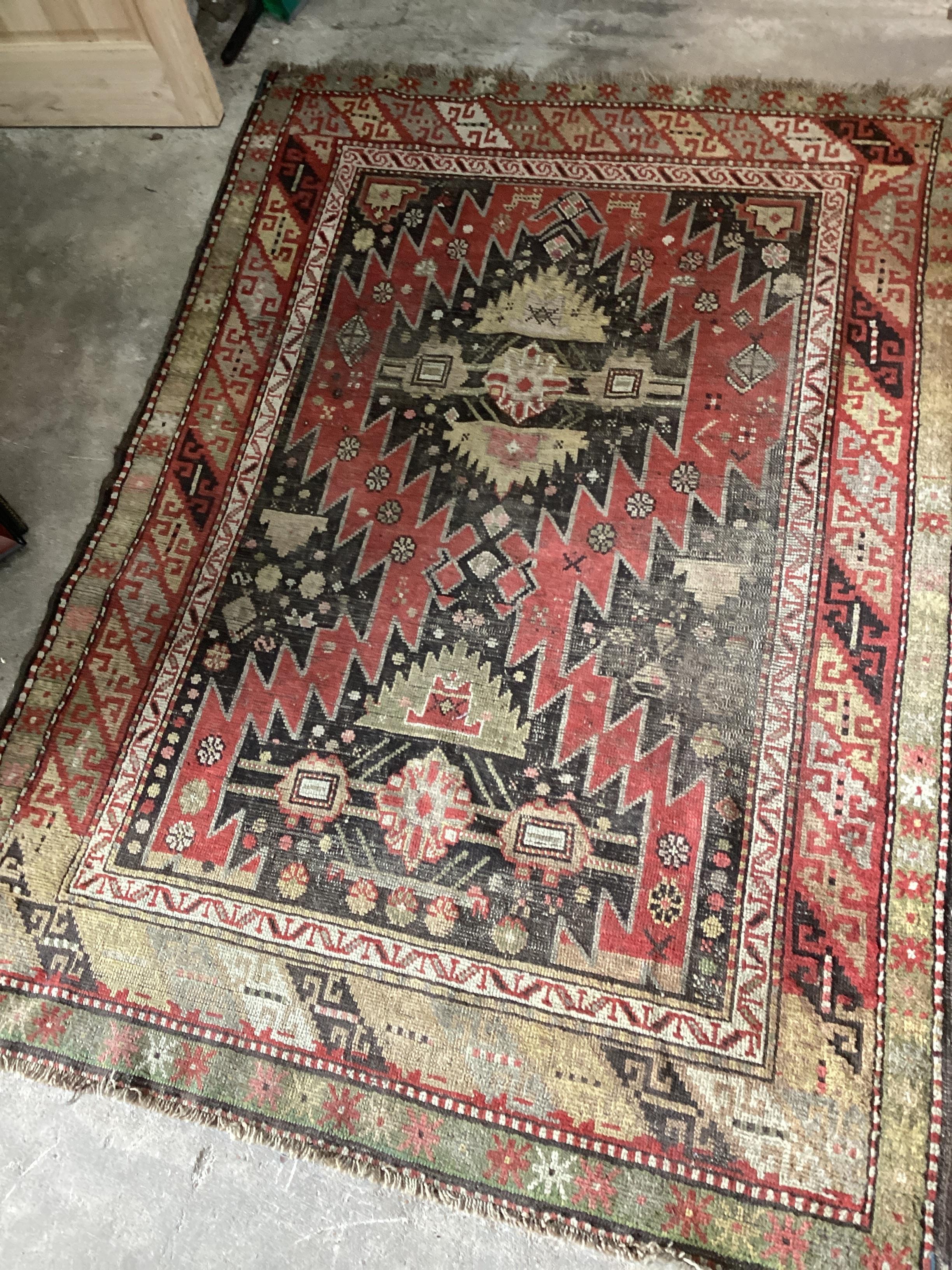 An antique Kazak rug, 190 x 140cm                                                                                                                                                                                           