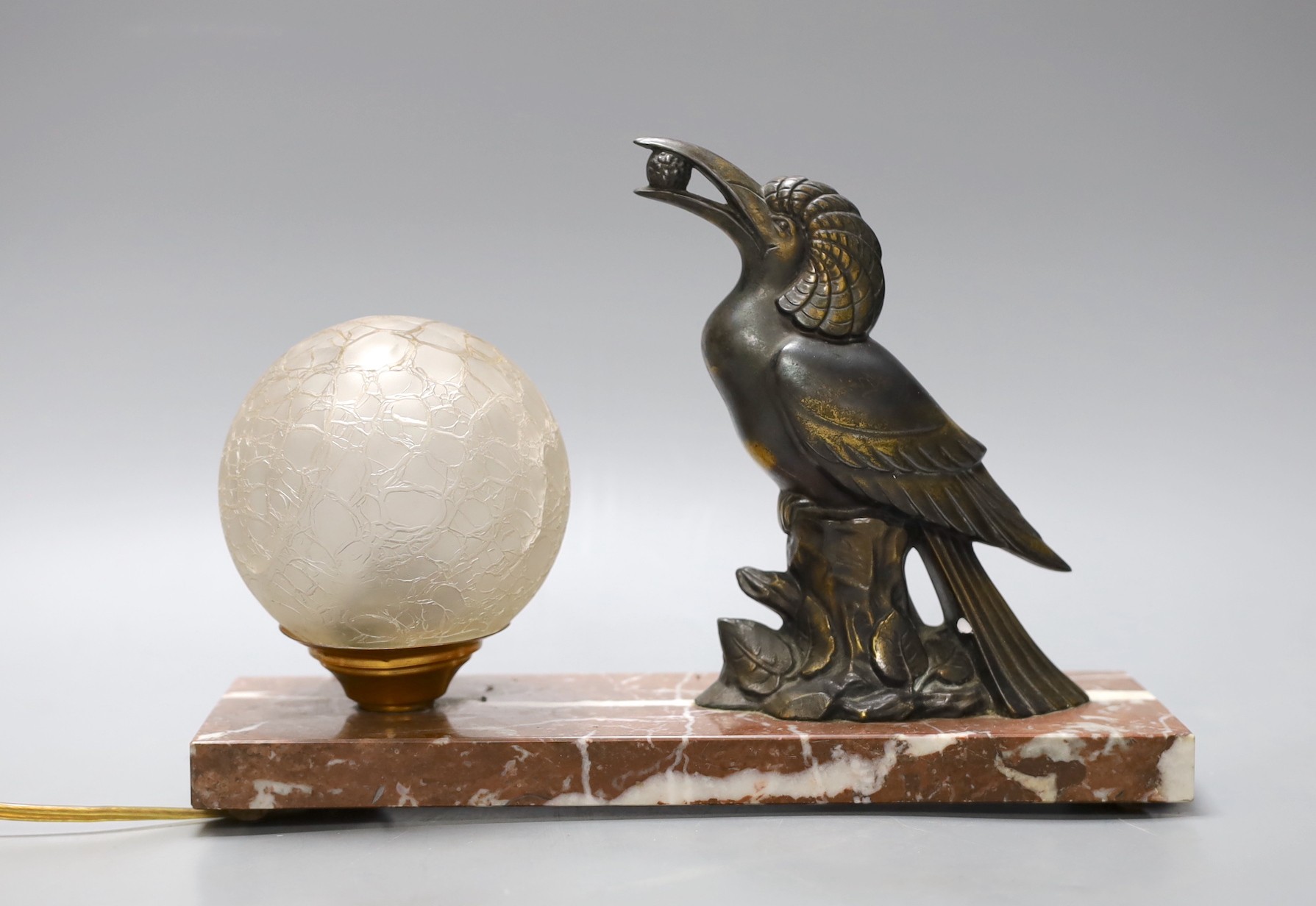 A French 1930's spelter toucan lamp with crackleware shade on plinth base, 18cm wide                                                                                                                                        