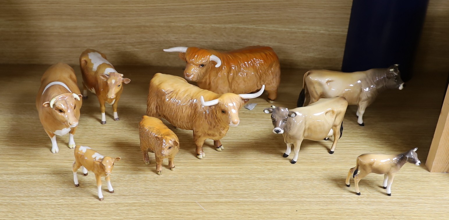 A Beswick Highland bull, cow and calf, a similar Freisian bull, cow and calf and a Dulsby Coy Boy, bull, cow and calf                                                                                                       