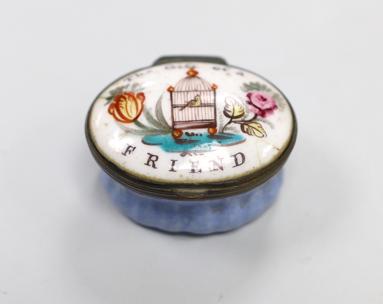 A small South Staffordshire enamel ‘Gift of a Friend’ patch box. 4.5cm wide                                                                                                                                                 