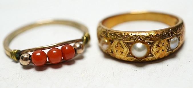 An engraved 18ct gold triple pearl set ring, size O, 6.9 grams, and an unmarked coral bead ring, size R, 1.5 grams. Condition - fair                                                                                        