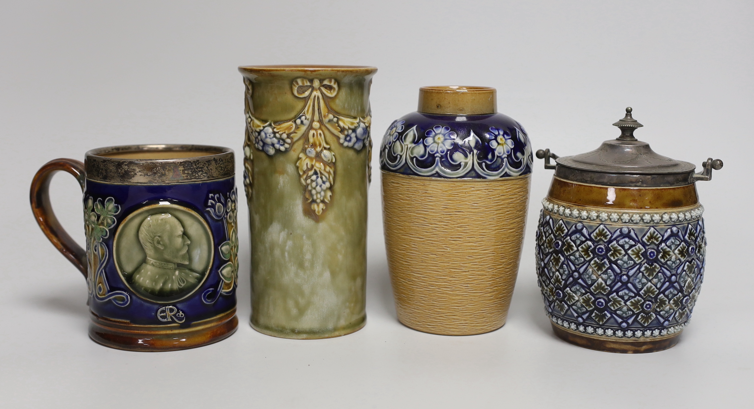 A Doulton Lambeth stoneware silver mounted jar and cover, two vases and a commemorative mug, tallest 15cm                                                                                                                   