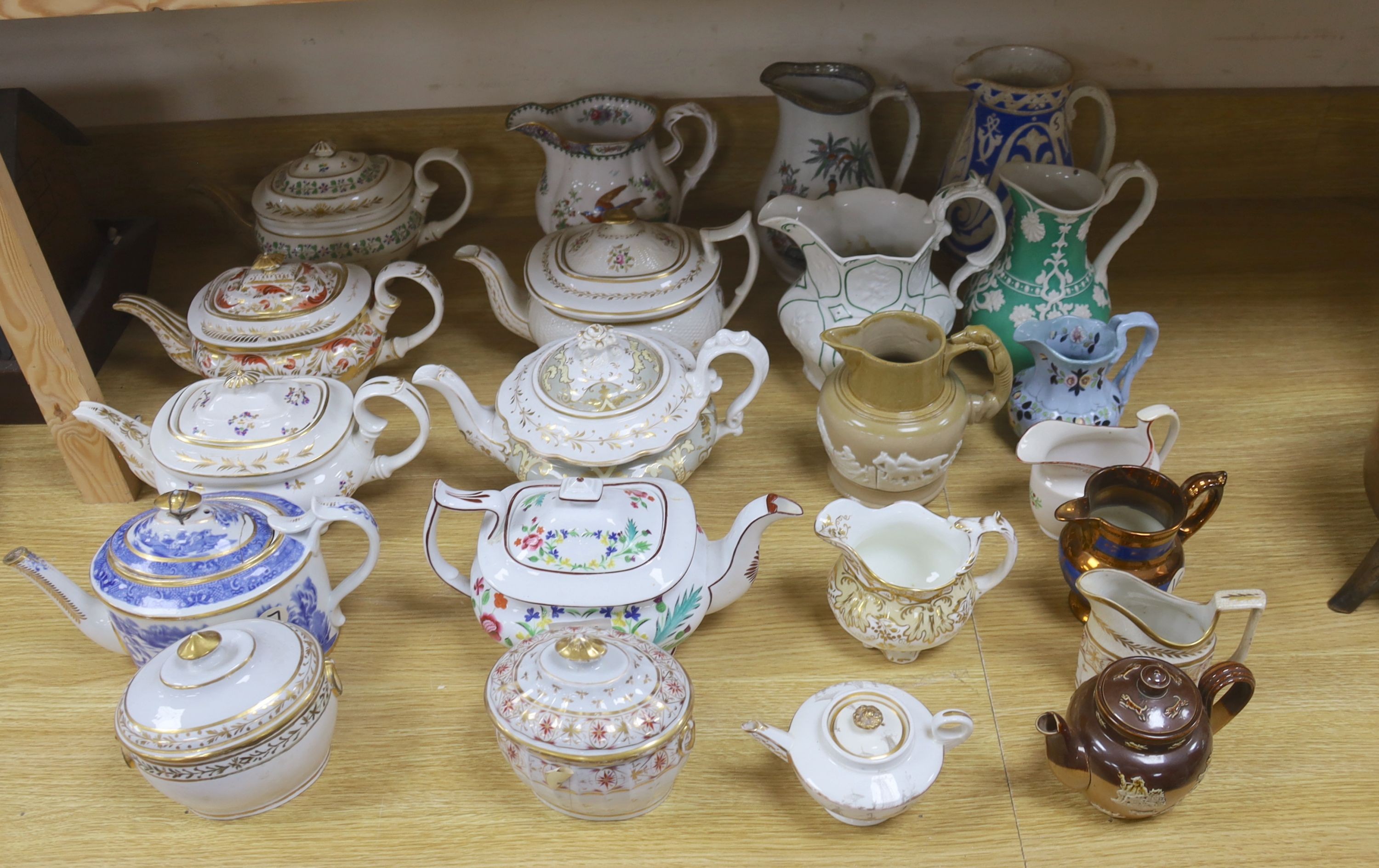 A group of mainly 19th century ceramics, teapots and jugs                                                                                                                                                                   