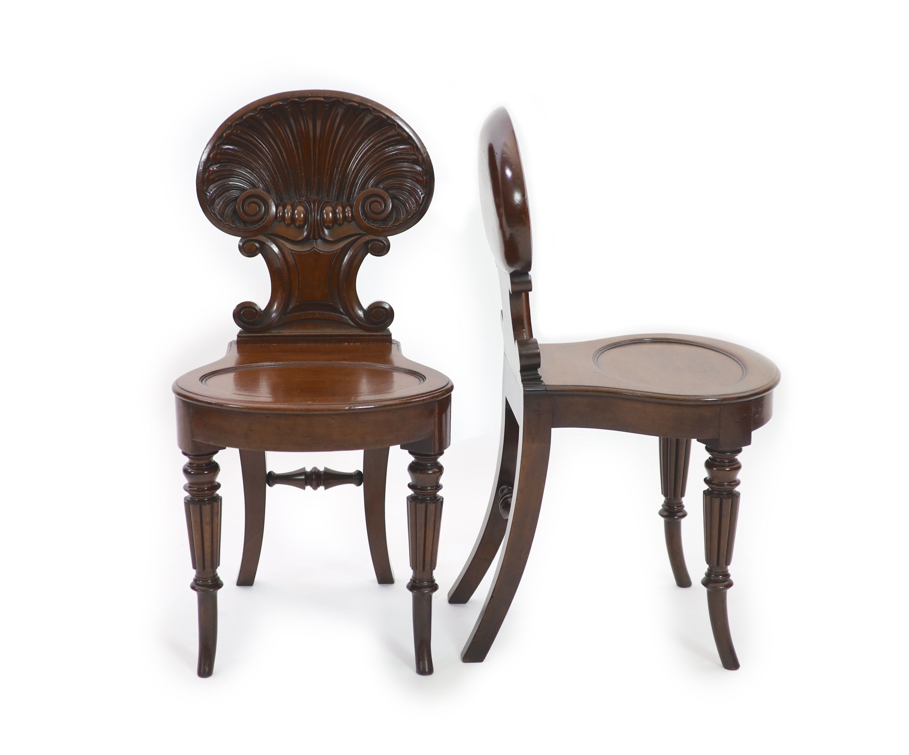 A pair of Regency mahogany hall chairs, attributed to Gillows, W.43cm H.87cm                                                                                                                                                