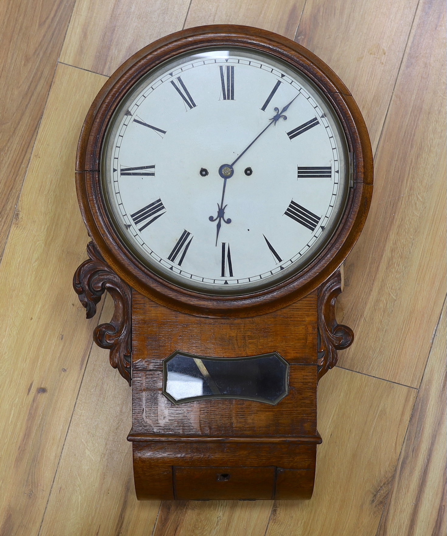 A 19th century oak eight day drop dial wall clock, with twin fusee movement, 65cm                                                                                                                                           