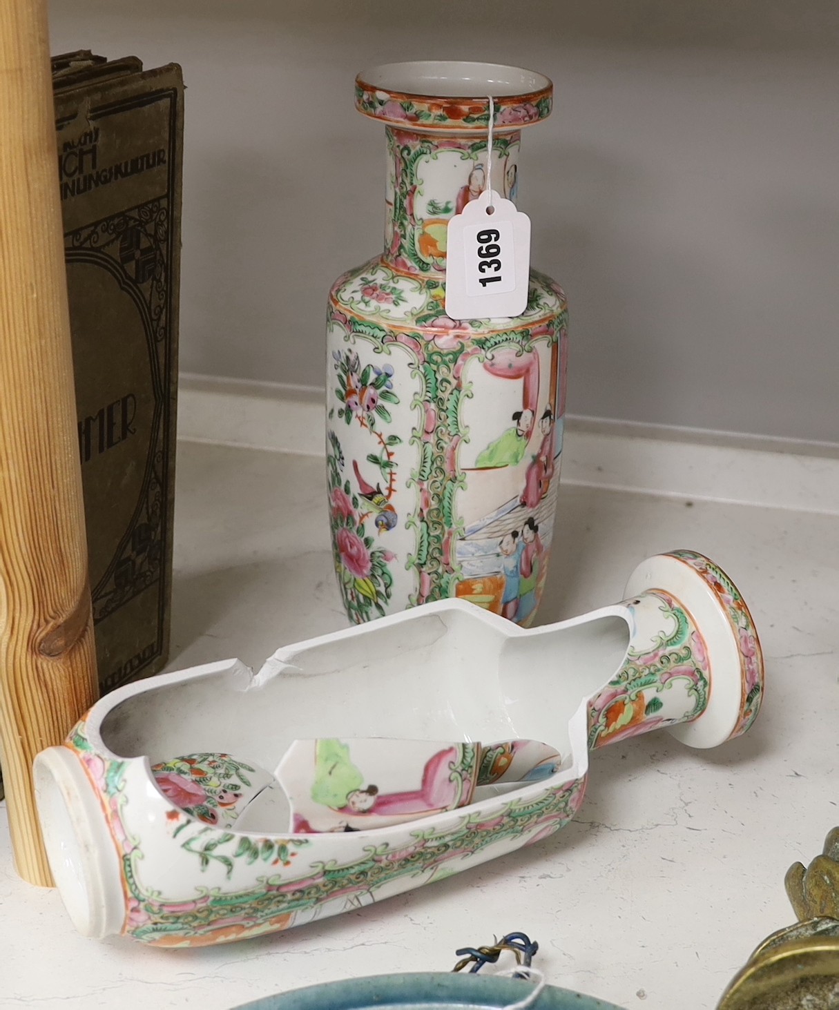 A pair of Chinese Canton famille rose baluster vases, one a.f. 29.5cm tall                                                                                                                                                  