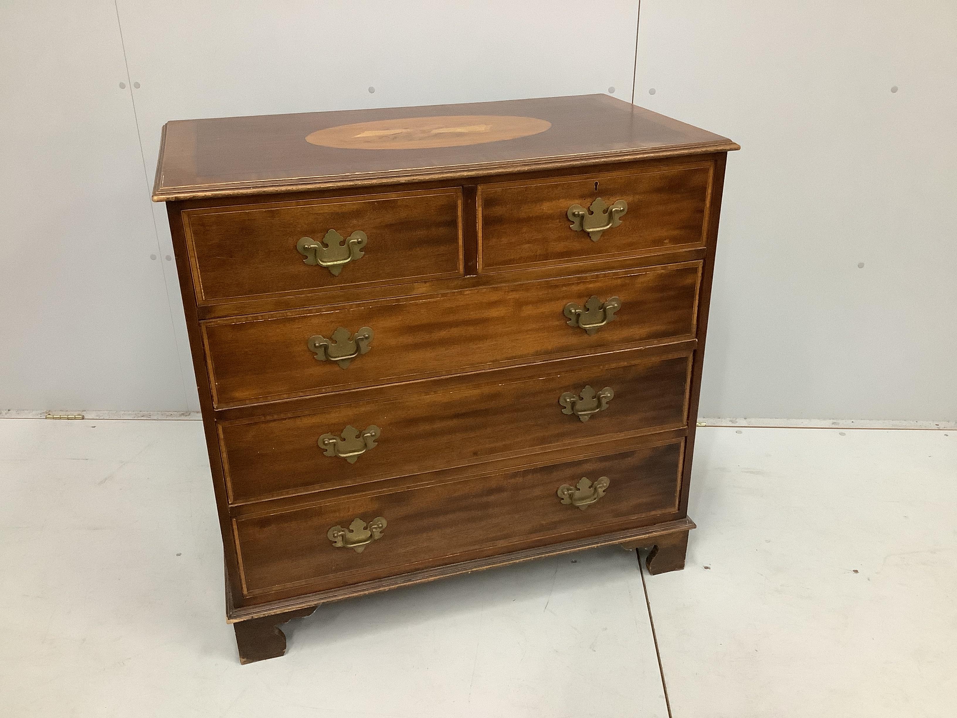 A reproduction George III style banded mahogany chest of drawers, with a later oval marquetry inlaid inset top, width 94cm, depth 53cm, height 91cm                                                                         