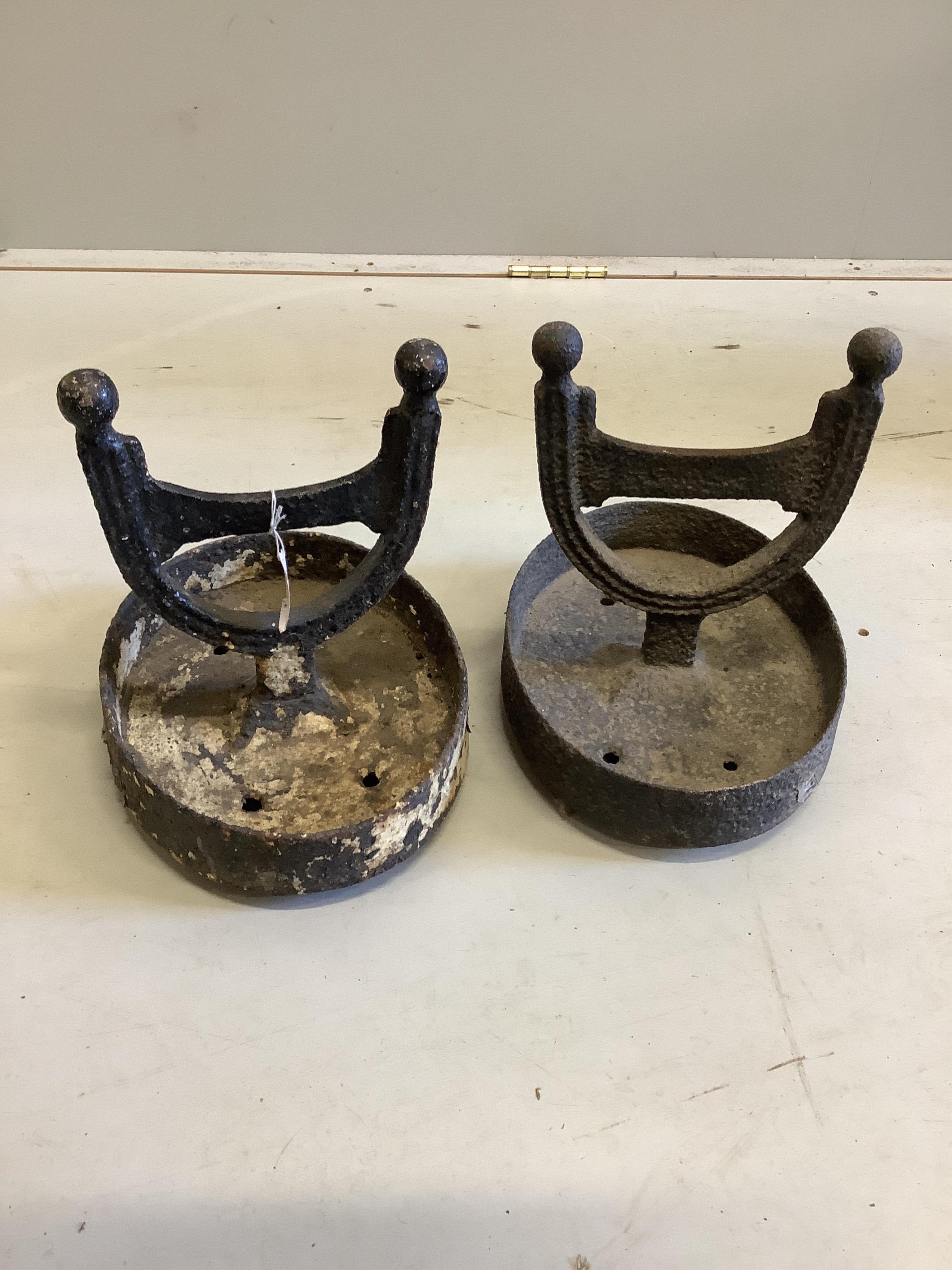 Two Victorian black painted cast iron boot scrapers, larger height 27cm. Condition - fair                                                                                                                                   