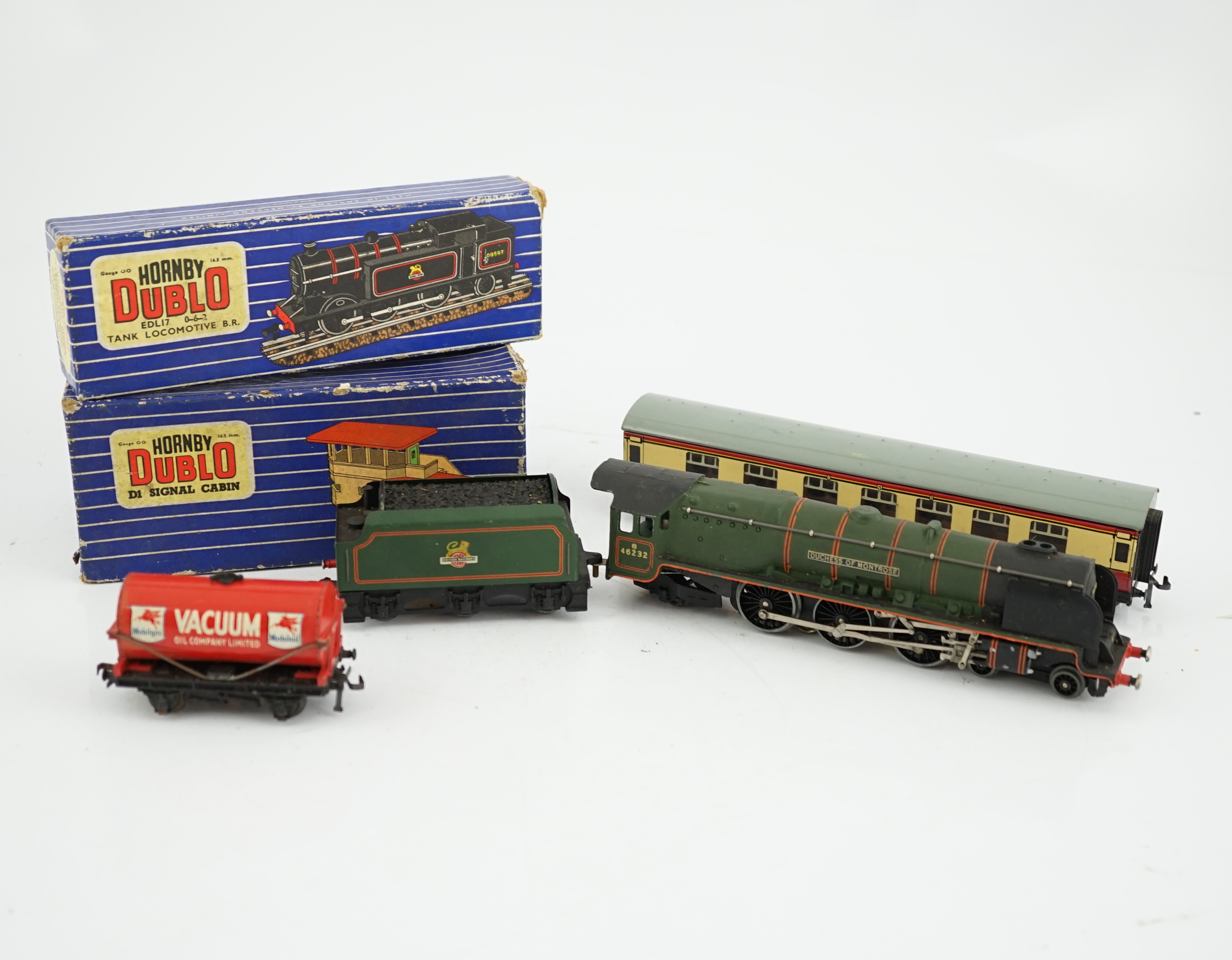 A collection of Hornby Dublo for 3-rail running, including two BR locomotives; a Duchess of Montrose and a Class N2 0-6-2T, together with two tinplate bogie coaches, wagons, signal box, signals, and a small quantity of t