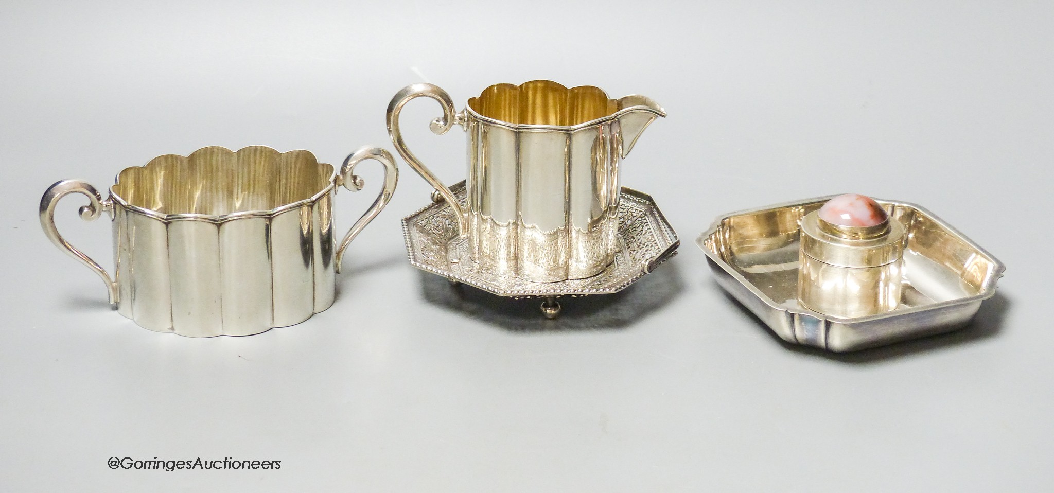 A collection of assorted silver to include a Persian pierced white metal dish, an 800 standard jug and bowl, an agate topped box, a small 925 sterling standard dish.                                                       