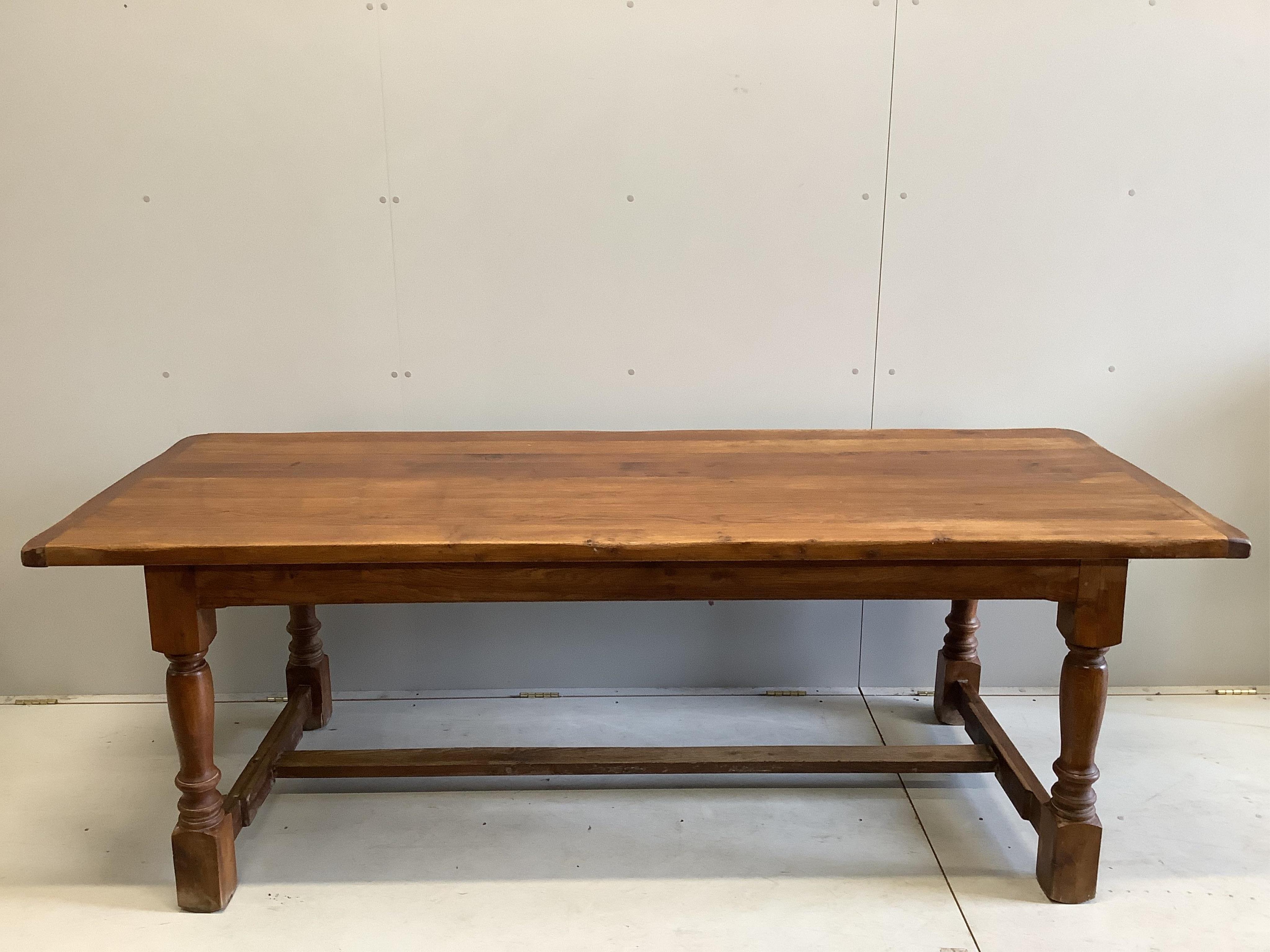 A rectangular oak refectory dining table, width 220cm, depth 84cm, height 74cm. Condition - fair                                                                                                                            