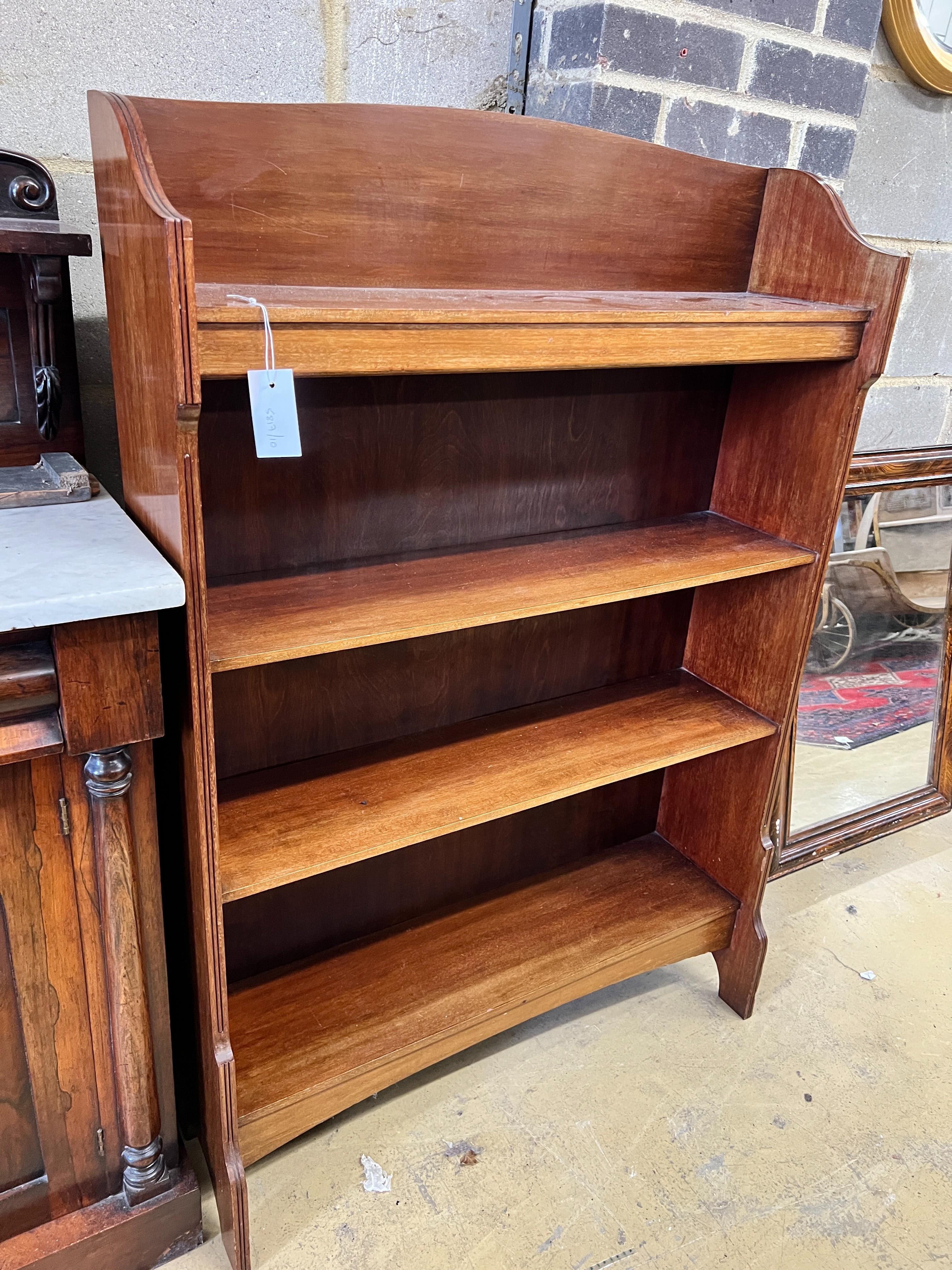 An Edwardian mahogany open bookcase, width 84cm, depth 23cm, height 122cm                                                                                                                                                   