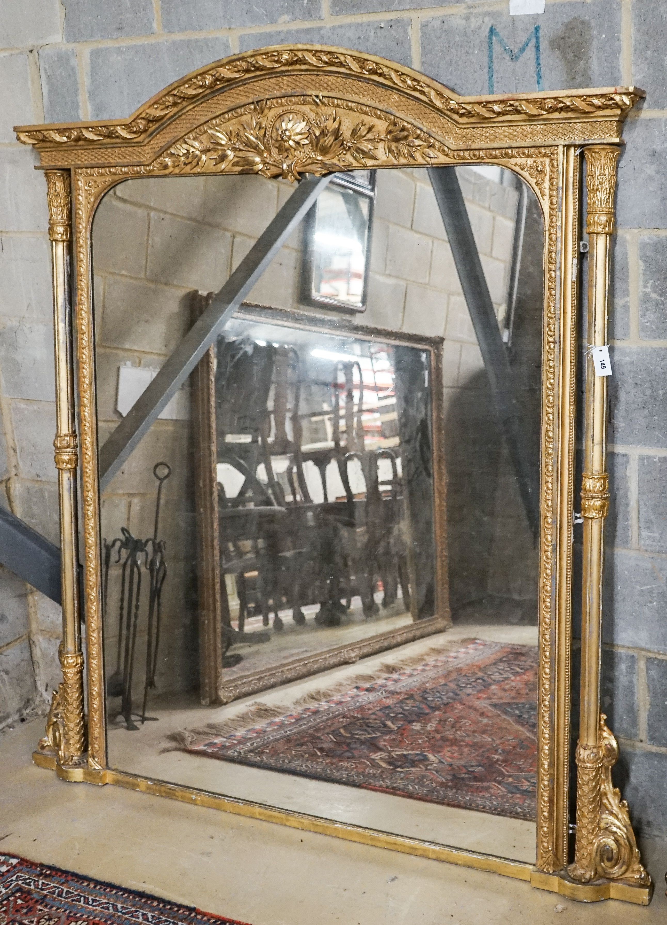 A Victorian carved giltwood and gesso overmantel mirror, the plate flanked by fluted columns, width 155cm, height 178cm                                                                                                     