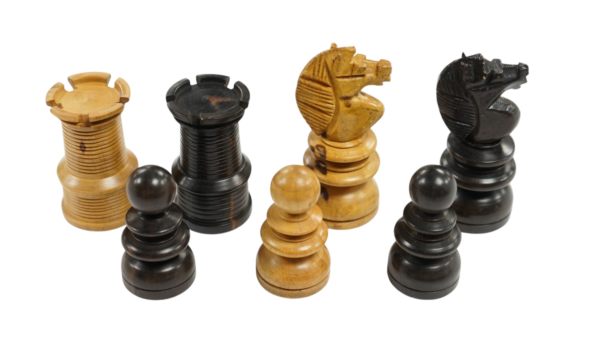 A Staunton turned wood chess set. Condition - good                                                                                                                                                                          