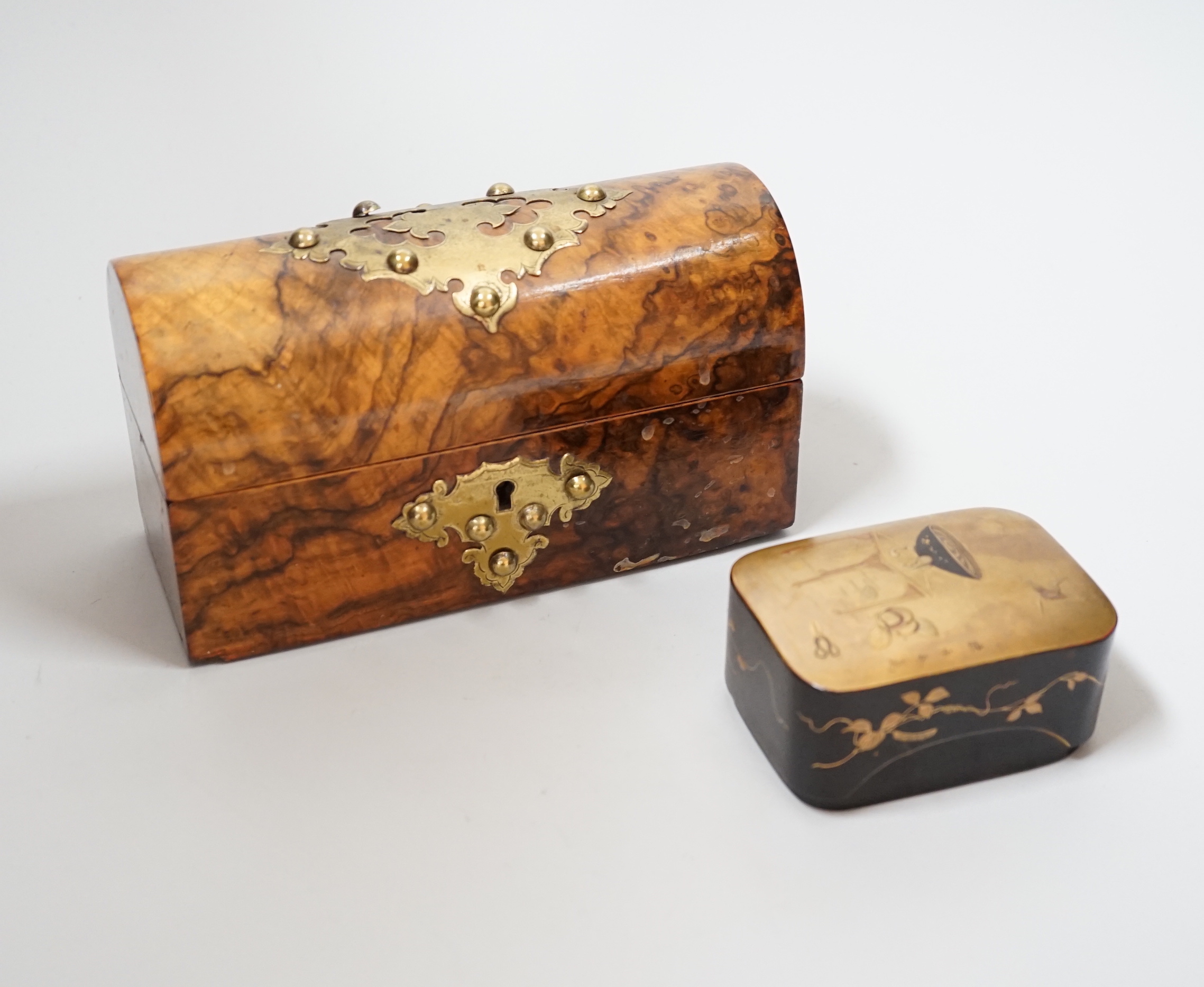 A walnut and brass-studded casket, 19.5cm wide, and a small lacquered box                                                                                                                                                   