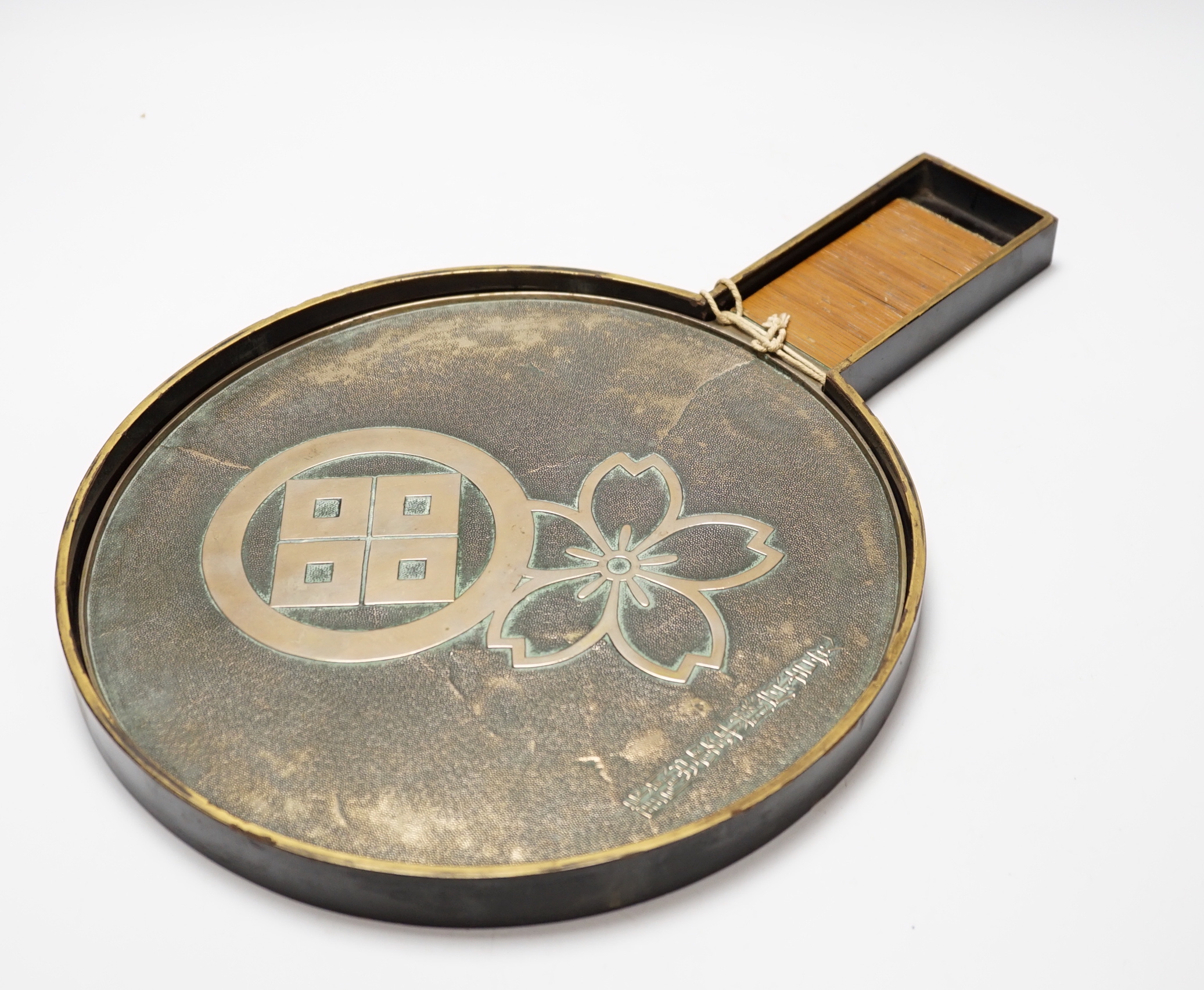 A large Japanese lacquer cased bronze hand mirror, Taisho/Showa period, mirror 38.5cm long                                                                                                                                  