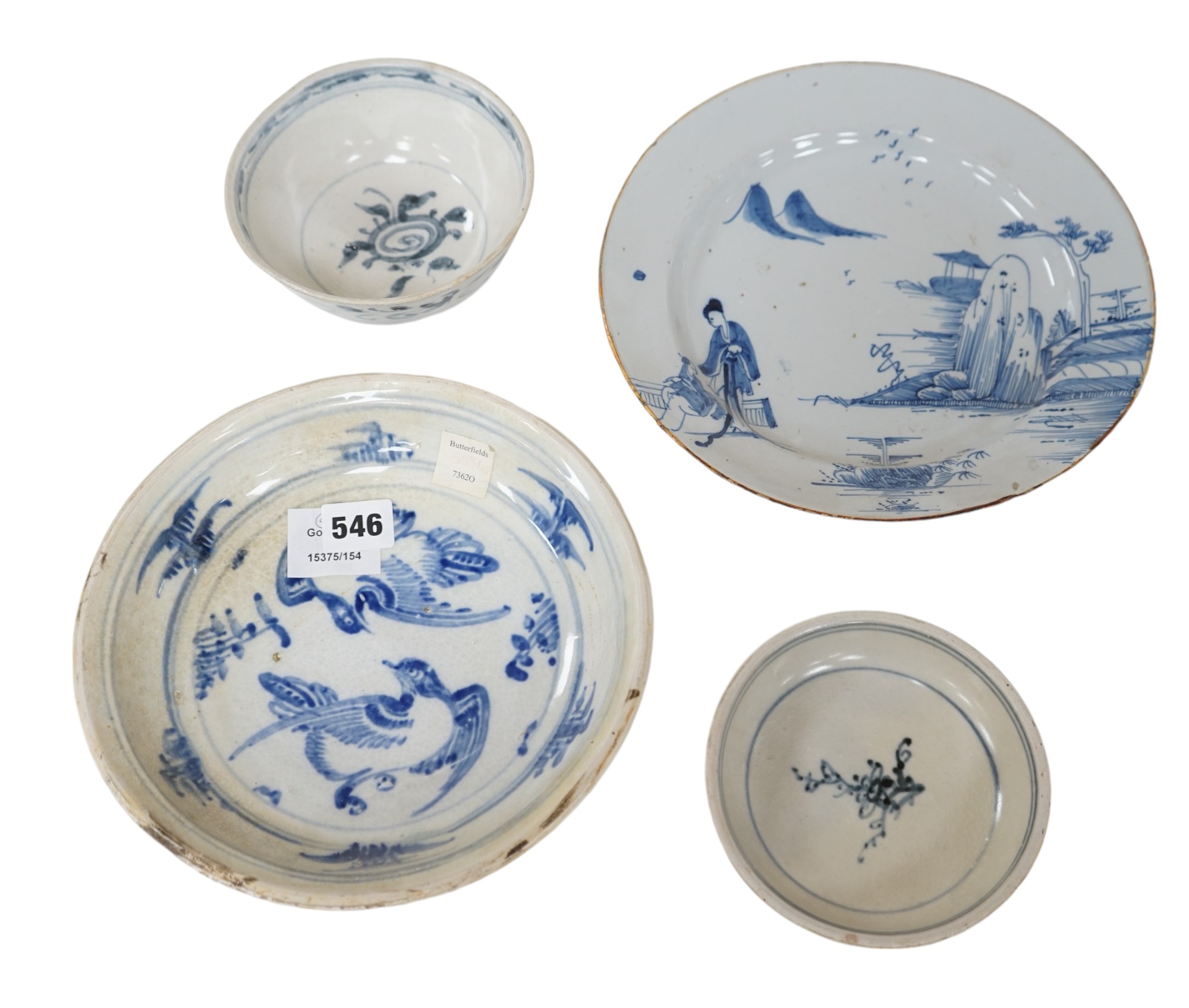 Three 15th century pieces from the Saga Visal Hoi-an hoard Vietnamese shipwreck and a delft dish, 26cm. Condition - commensurate with age                                                                                   